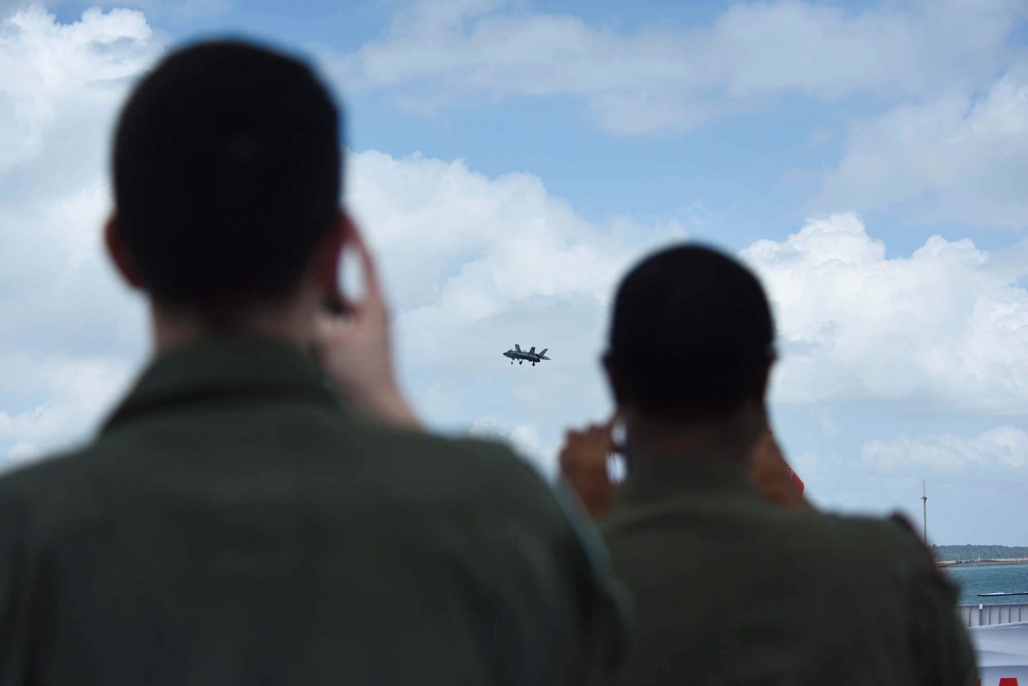 MQ-9 Reaper pilots take photos and video of an F-35 doing a demonstration at Singapore Airshow.