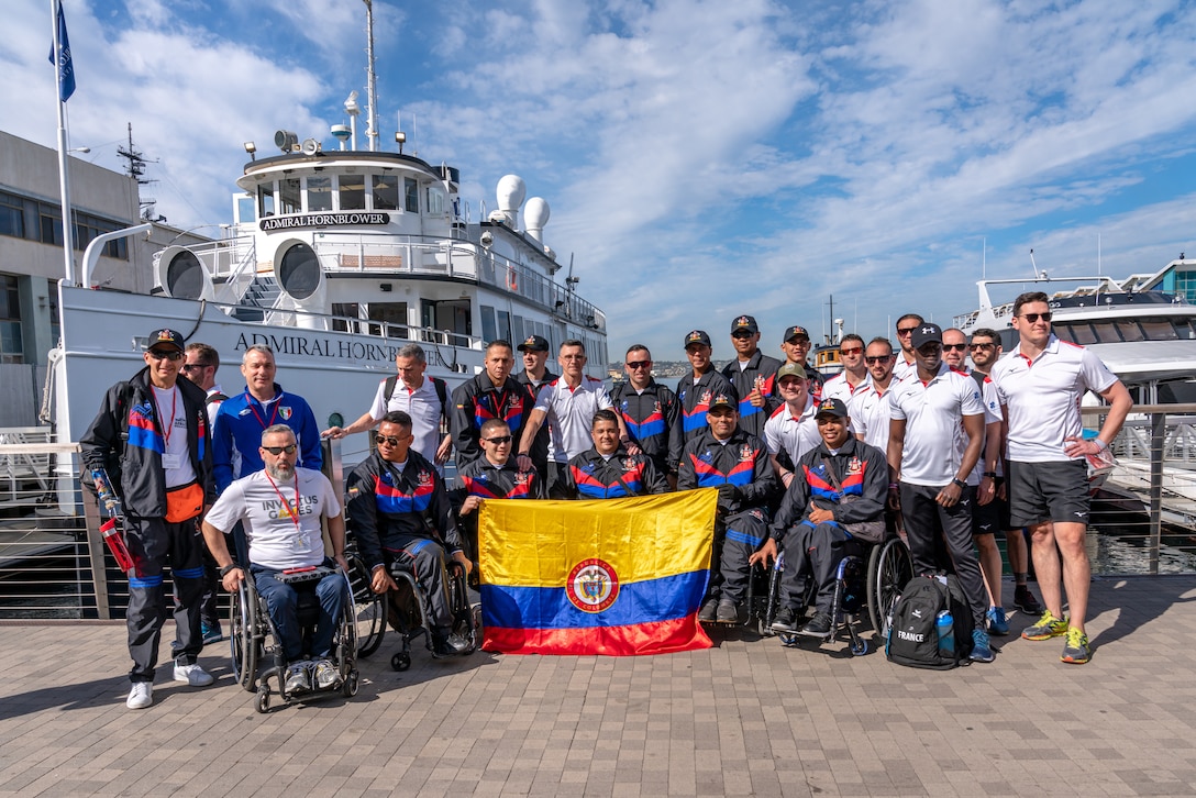 The Colombian team presents the nation’s colors at the San Diego Harbor during the 2020 Marine Corps Trials International Day at San Diego, California, Feb. 28. The Marine Corps Trials promotes rehabilitation through adaptive sports participation and serves as the primary venue to select Marine Corps participants for the DoD Warrior Games.