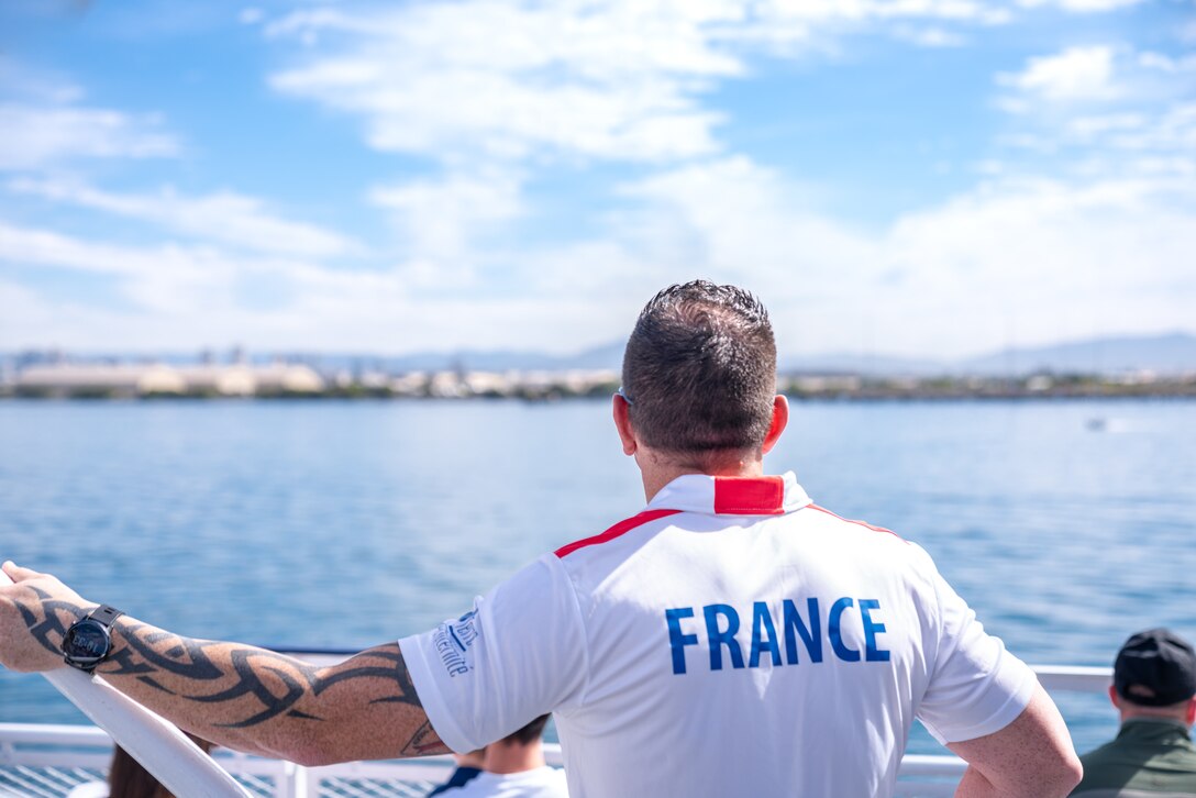 An athlete from Team France observes the San Diego Harbor from the deck of the Hornblower Cruise during the 2020 Marine Corps Trials International Day at San Diego, California, Feb. 28. The Marine Corps Trials promotes recovery and rehabilitation for nearly 200 recovering service members and veterans through adaptive sport participation and serves as the primary venue to select Marine Corps participants for the DoD Warrior Games.