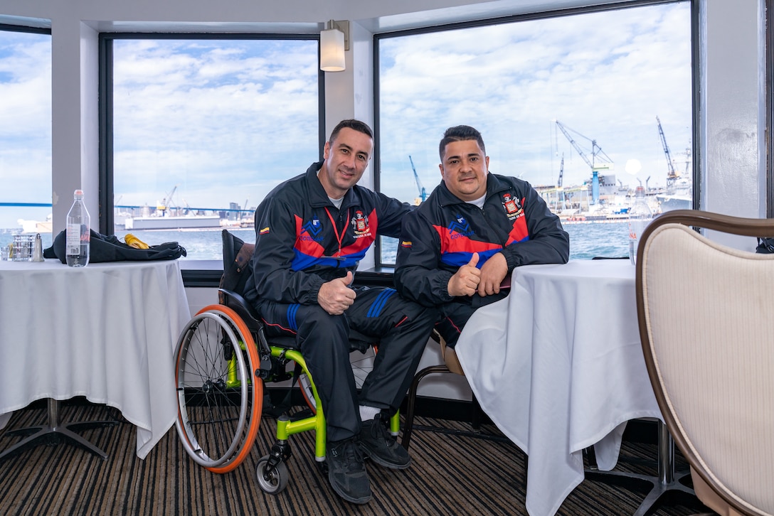 Athletes from Team Colombia pose for photo from interior of the Hornblower Cruise ship during the 2020 Marine Corps Trials International Day at San Diego, California, Feb. 28. The Marine Corps Trials promotes rehabilitation through adaptive sport participation and develops camaraderie among recovering service members (RSMs) and veterans. Additionally, the Trials serve as an opportunity for RSMs to demonstrate their achievements and serves as the primary venue to select Marine Corps participants for the DoD Warrior Games.
