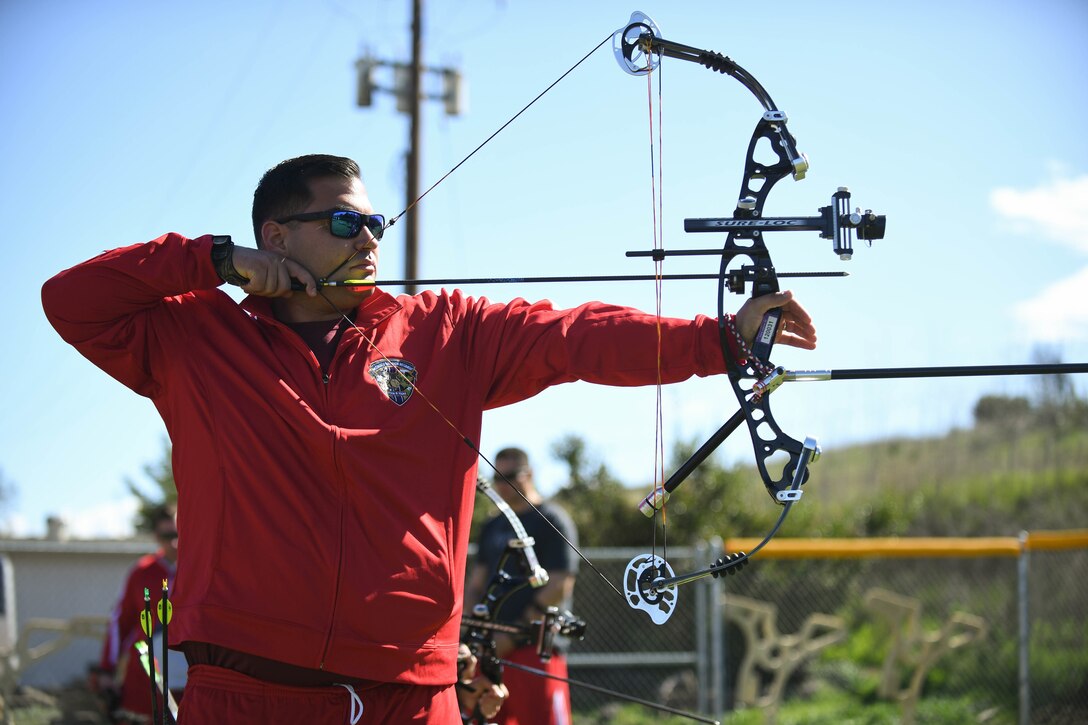 U.S. Marine Corps Staff Sgt. James Wirth adjusts his bow and practices his shooting stance in preparation for the 2020 Marine Corps Trials at Marine Corps Base Camp Pendleton, Calif., March 2. The Marine Corps Trials promotes recovery and rehabilitation through adaptive sport participation and develops camaraderie among recovering service members and veterans.