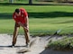 A U.S. Marine Corps Staff Sgt. Jonathan Wheeler practices chipping out of the sand before moving to the next hole during the 2020 Marine Corps Trials at Marine Corps Base Camp Pendleton, Calif., March 4. The Marine Corps Trials promotes recovery and rehabilitation through adaptive sports participation and develops camaraderie among recovering service members and veterans