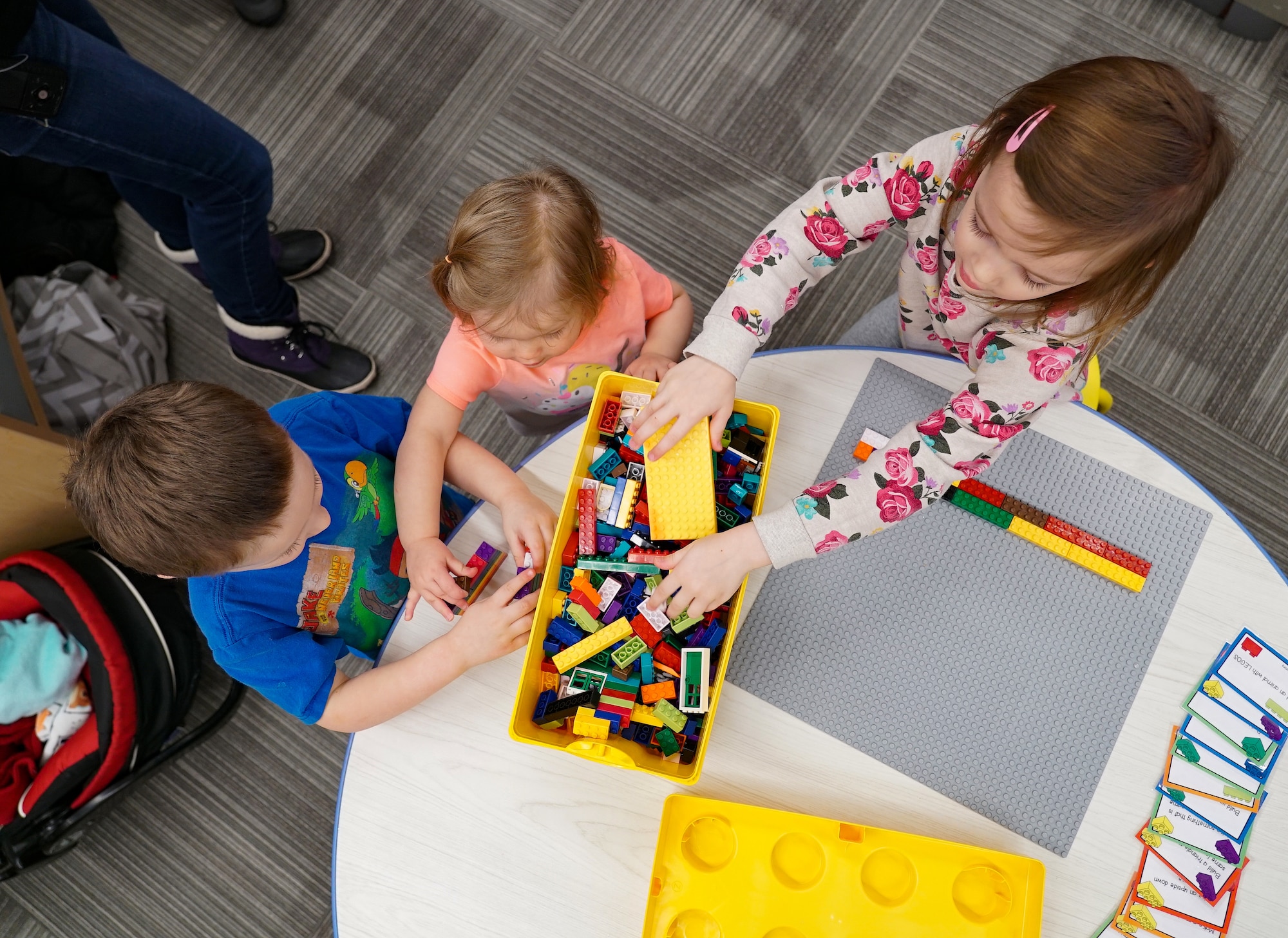 Children play together with building blocks March 4, 2020, in the library on Grand Forks Air Force Base, N.D. The library officially re-opened after being closed for six months to undergo renovations that improved the accessibility and brought the facility up to date with the community’s needs. (U.S. Air Force photo by Senior Airman Elora J. McCutcheon)