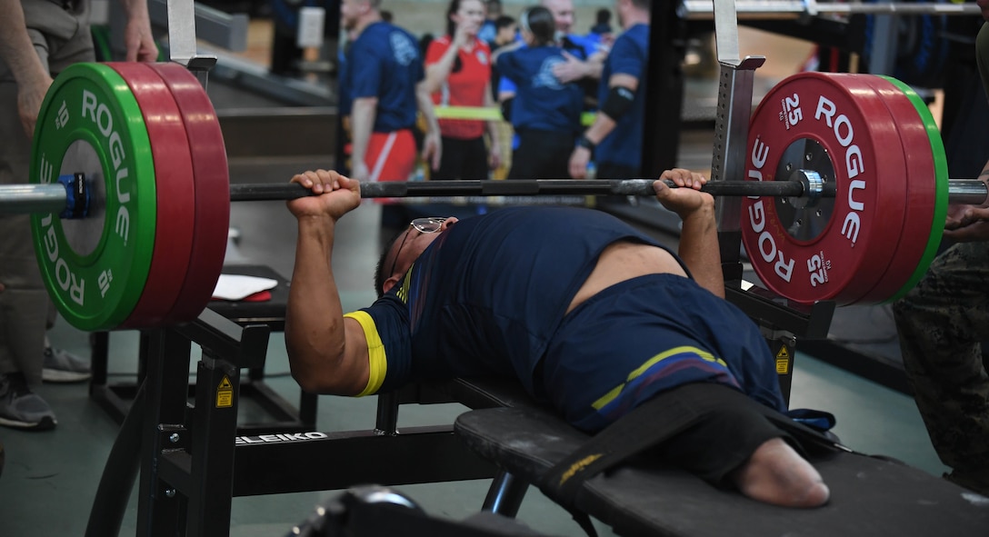 A recovering service member with the Colombian Armed Forces competes in the 2020 Marine Corps Trials powerlifting competition at Marine Corps Base Camp Pendleton, Calif., March 4. The Marine Corps Trials is an adaptive sports event involving more than 200 wounded, ill or injured Marines, Sailors, veterans and international competitors.