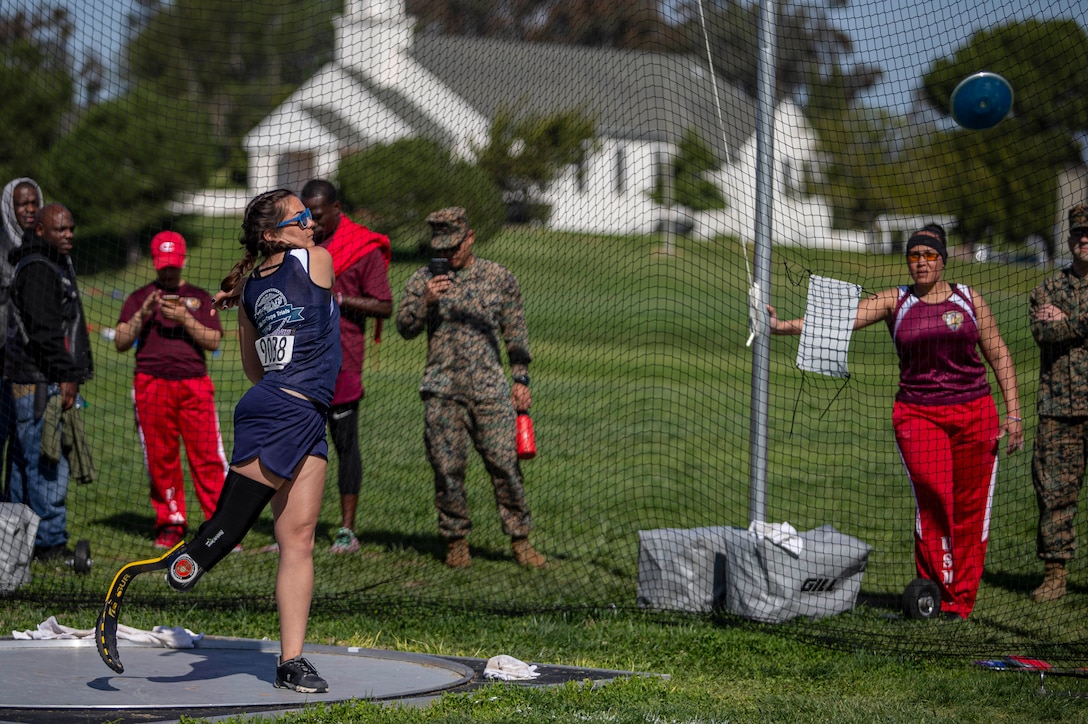 U.S. Marine Corps veteran Annika Hutsler throws a discus during the 2020 Marine Corps Trials competition at Marine Corps Base Camp Pendleton, California, March 5, 2020. The Marine Corps Trials promotes rehabilitation through adaptive sports participation for recovering service members and veterans all over the world.