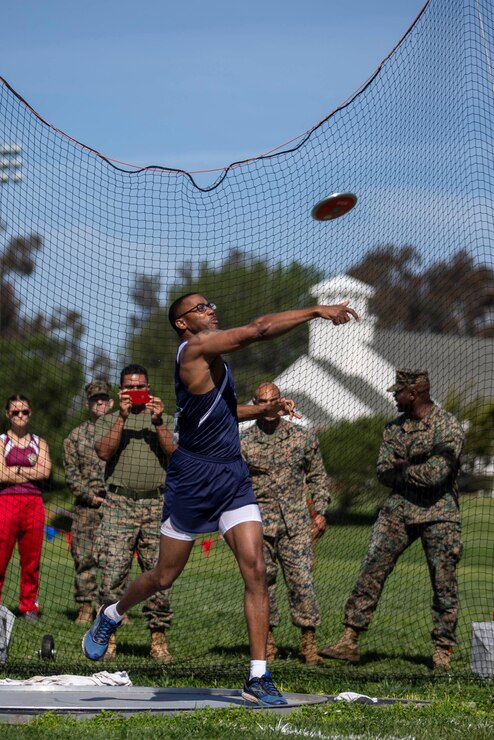 U.S. Marine 1st Sgt. Michael Landry, with 1st Law Enforcement Battalion, I Marine Expeditionary Force Information Group, I Marine Expeditionary Force, throws a discus during the 2020 Marine Corps Trials competition at Marine Corps Base Camp Pendleton, California, March 5, 2020. The Marine Corps Trials promotes rehabilitation through adaptive sports participation for recovering service members and veterans all over the world.