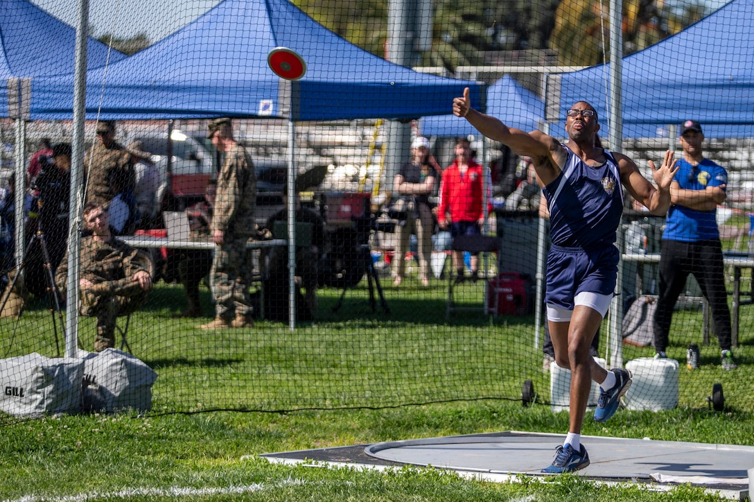 U.S. Marine 1st Sgt. Michael Landry, with 1st Law Enforcement Battalion, I Marine Expeditionary Force Information Group, I Marine Expeditionary Force, throws a discus during the 2020 Marine Corps Trials competition at Marine Corps Base Camp Pendleton, California, March 5, 2020. The Marine Corps Trials promotes rehabilitation through adaptive sports participation for recovering service members and veterans all over the world.