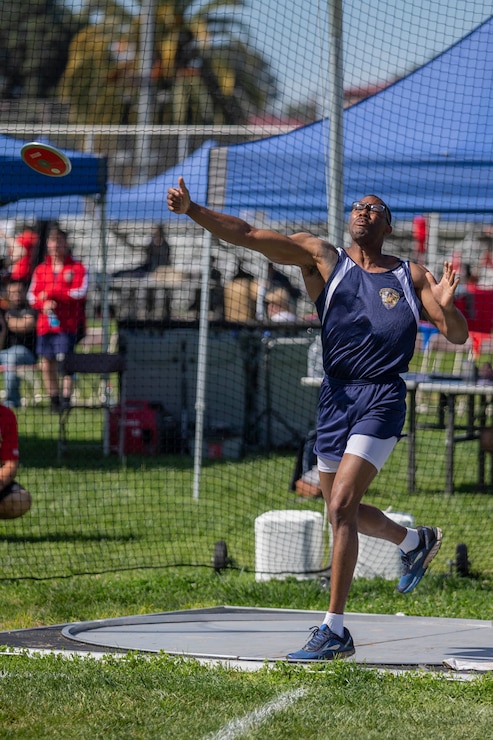 U.S. Marine 1st Sgt. Michael Landry, with 1st Law Enforcement Battalion, I Marine Expeditionary Force Information Group, I Marine Expeditionary Force, throws a discus during the 2020 Marine Corps Trials competition at Marine Corps Base Camp Pendleton, California, March 5, 2020. The Marine Corps Trials promotes rehabilitation through adaptive sports participation for recovering service members and veterans all over the world.