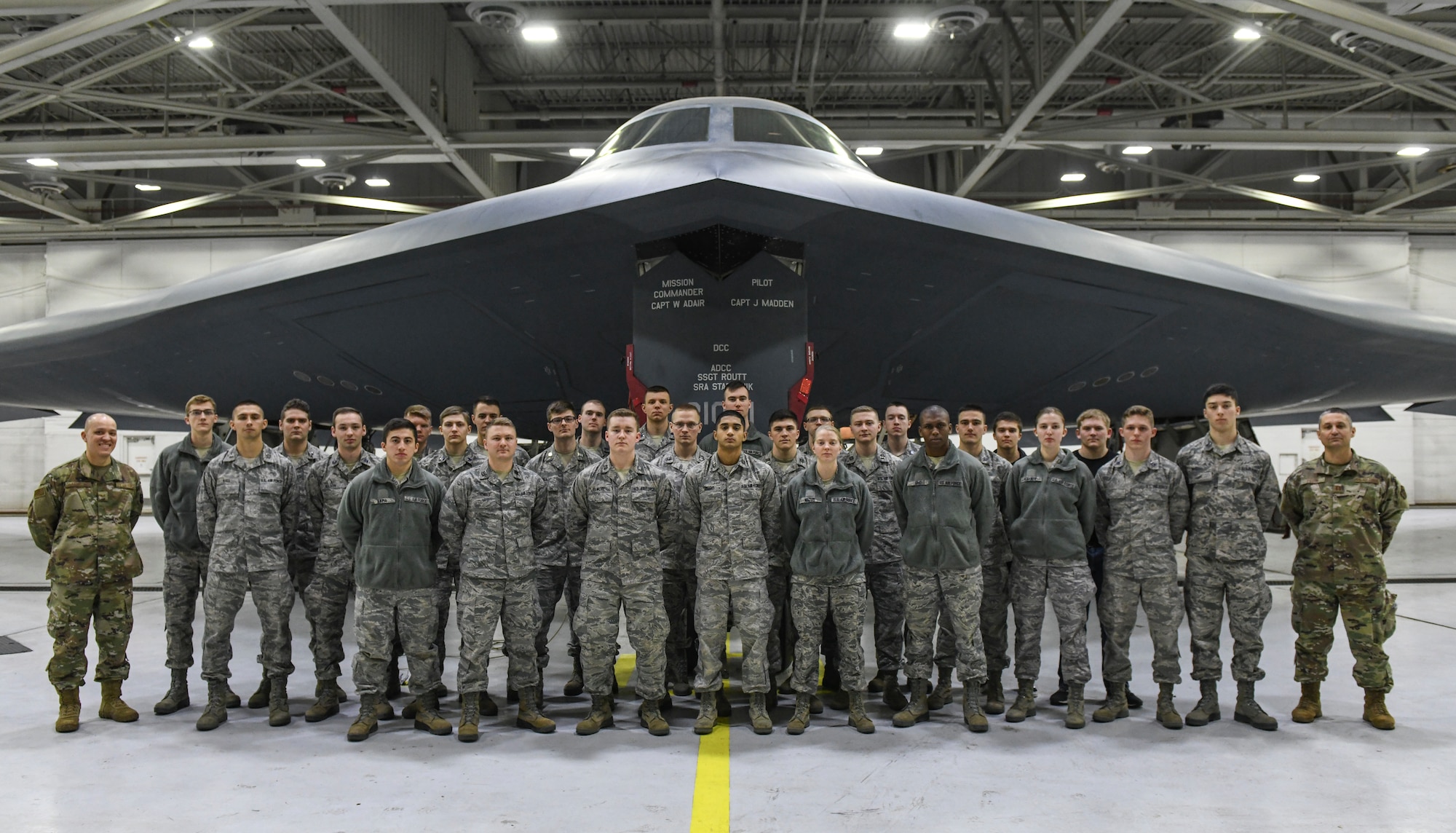 Indiana State University Indiana, Detachment 218 Air Force Reserve Officer Training Corps cadets stand in front of a B-2 Spirit Stealth Bomber during a tour at Whiteman Air Force Base, Mo., Mar. 4, 2020. The 28 cadets learned about what it takes to be a pilot and operate the Air Force’s premiere stealth airframe—the B-2 Spirit Stealth Bomber. (U.S. Air Force photo by Staff Sgt. Sadie Colbert)