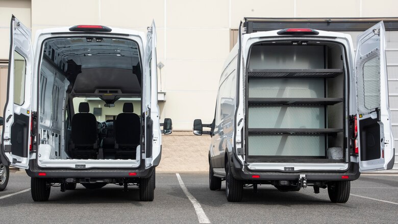 A transit van, stripped of interior, is parked next to a modified transit van March 5, 2020, at Fairchild Air Force Base, Washington.