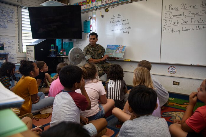 U.S. Marine Corps Col. Raul Lianez, commanding officer, Marine Corps Base Hawaii, reads Dr. Seuss’ the Lorax during a visit to Mokapu Elementary School, March 2, 2020. Lianez visited Mokapu Elementary to read books to the students and stress the importance of reading and learning on National Read Across America Day. (U.S. Marine Corps photo by Lance Cpl. Samantha Sanchez)