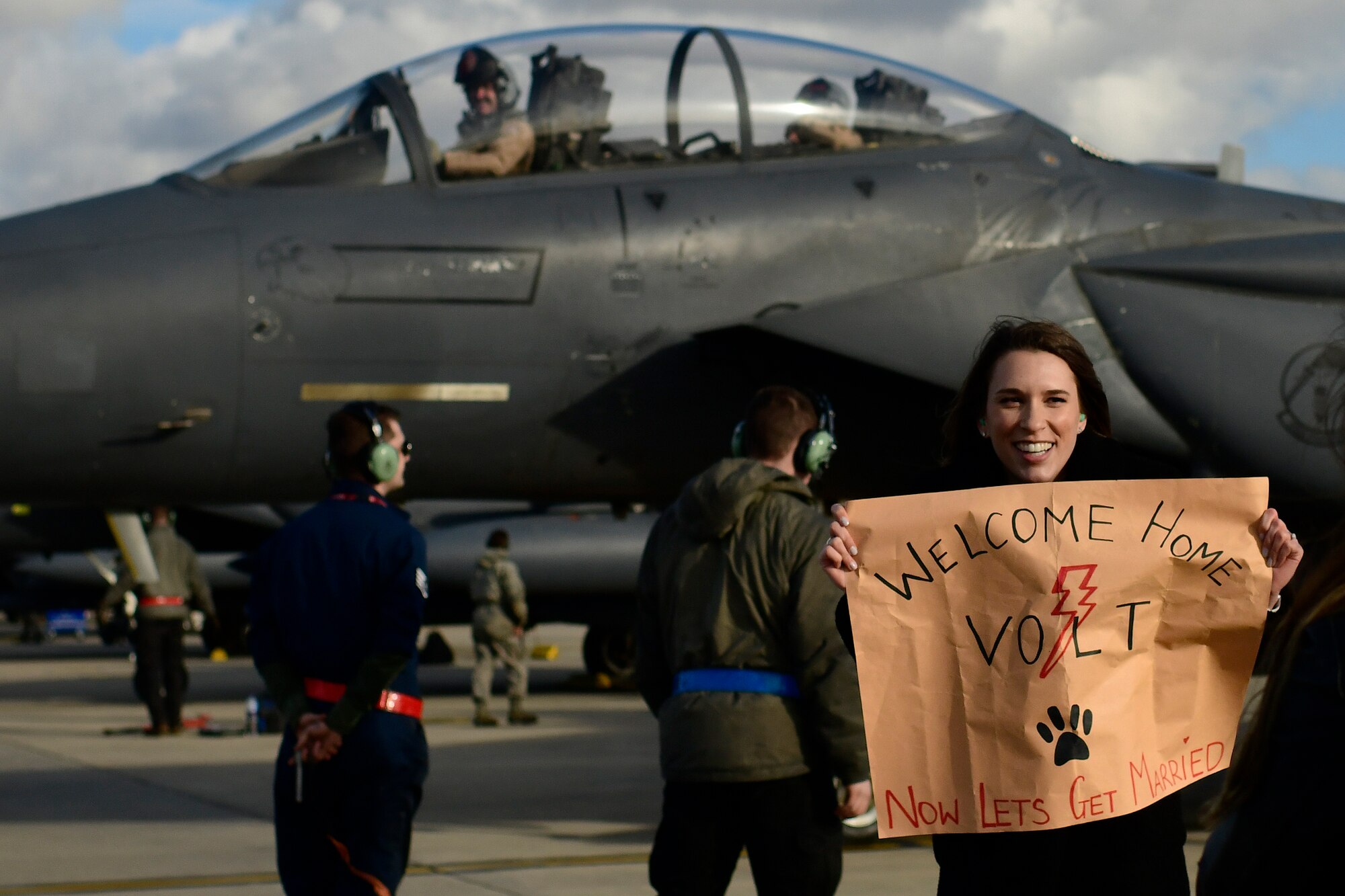 Loved ones welcome home F-15E Strike Eagle aircrews assigned to the 494th Fighter Squadron at Royal Air Force Lakenheath, England, March 1, 2020.The 494th FS returned from a six-month deployment to the United Arab Emirates in support of on going operations in the Middle East. (U.S. Air Force photo/Master Sgt. Matthew Plew)