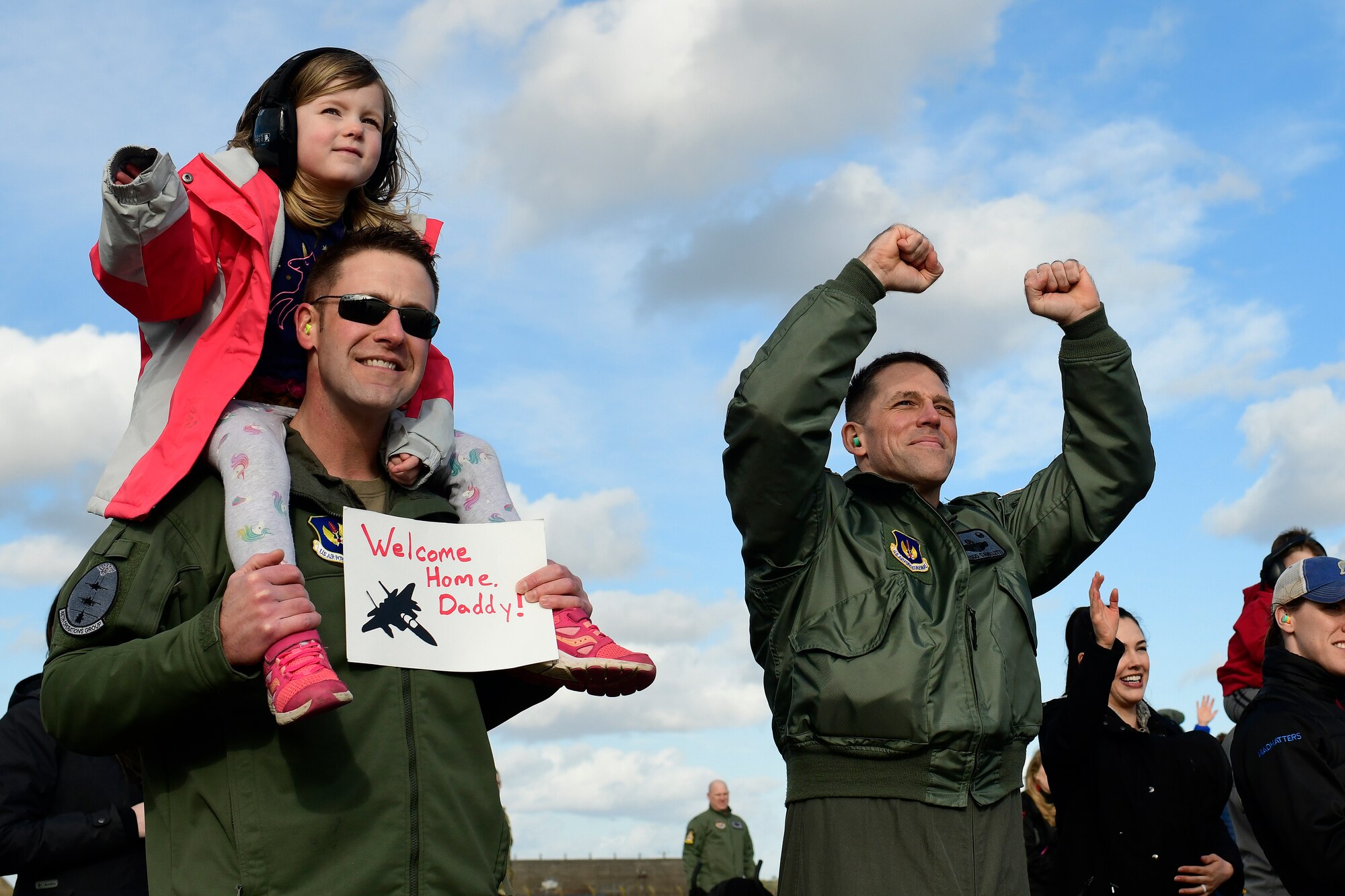 Lt. Col. William Wooten and Col. Jason Camilletti welcome home F-15E Strike Eagle aircrews assigned to the 494th Fighter Squadron at Royal Air Force Lakenheath, England, March 1, 2020.The 494th FS returned from a six-month deployment to the United Arab Emirates in support of on going operations in the Middle East. (U.S. Air Force photo/Master Sgt. Matthew Plew)
