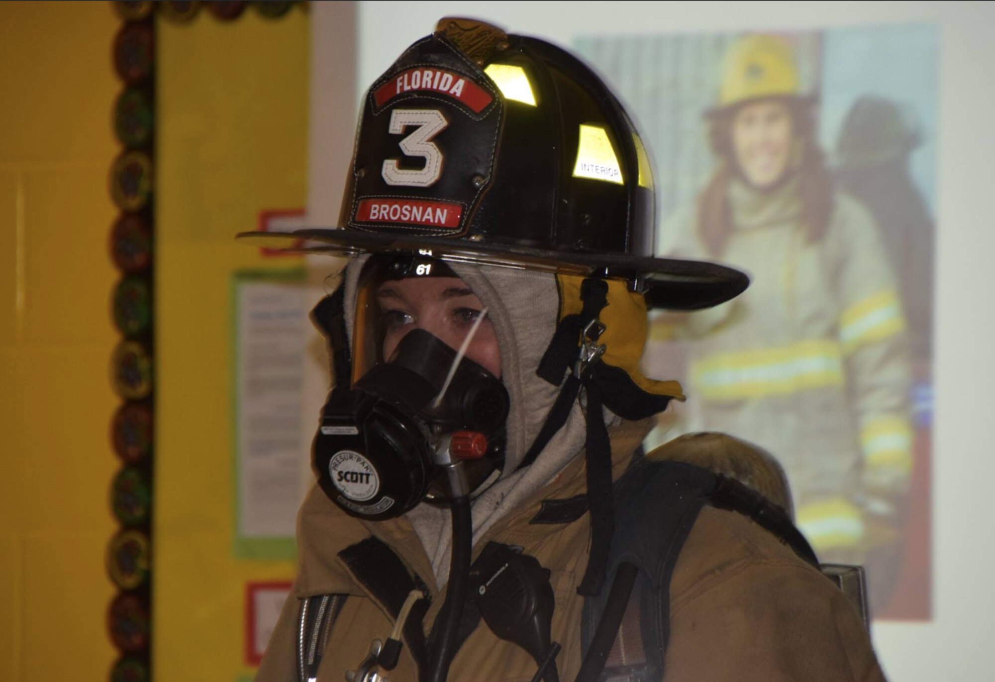 Airman 1st Class Sinéad Brosnan, 27th Special Operations Health Care Operations Squadron aerospace medical technician, displays what she wears when responding to a fire during a school visit in Florida, New York, in 2016. Brosnan applied for a position with the New York City Fire Department and was told she had passed three days after swearing in to the Air Force. (Courtesy Photo)