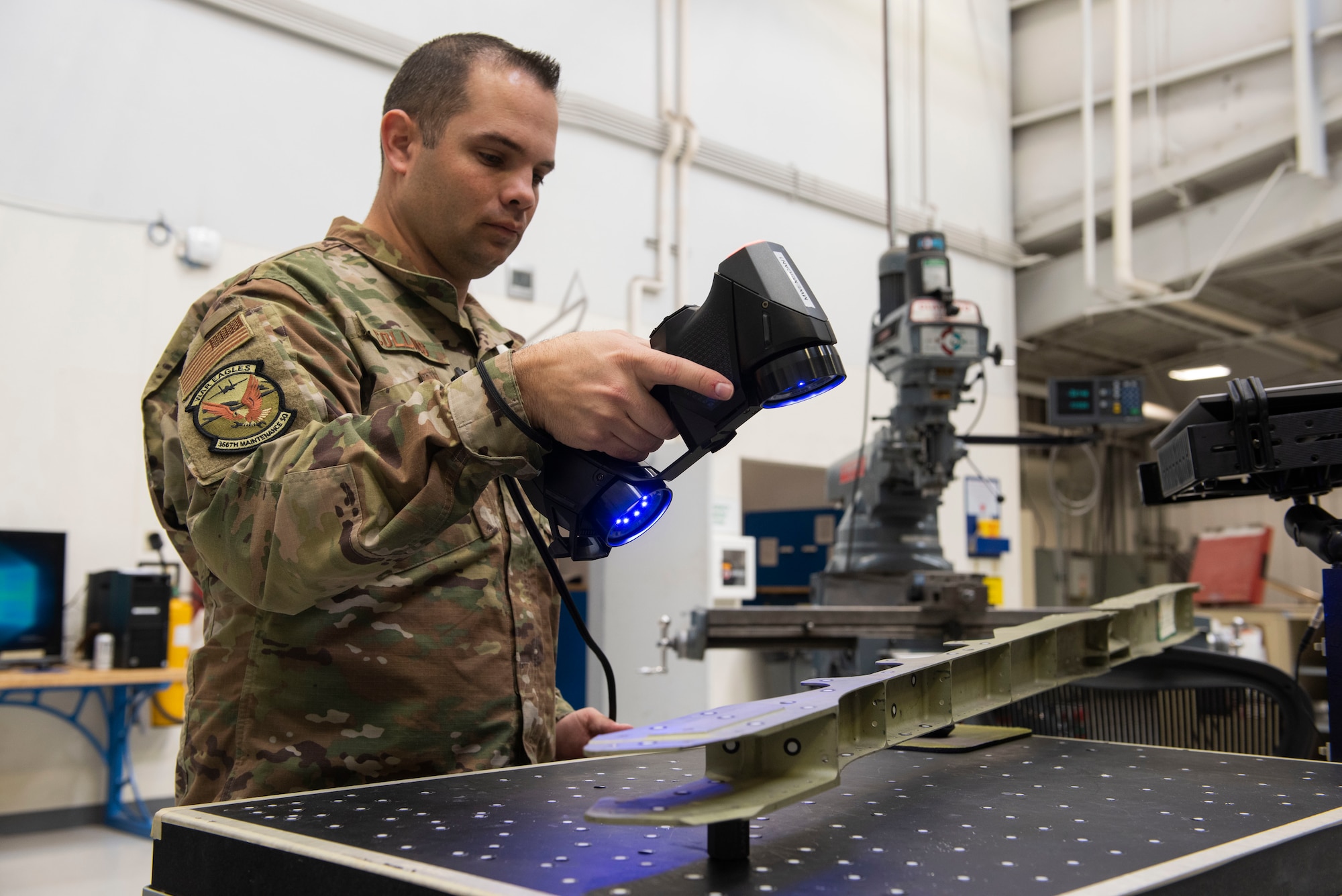 U.S. Air Force Tech. Sgt. Kevin Collins, 366th Maintenance Squadron aircraft metals technology section chief scans an aircraft structure, March 2, 2020, at Mountain Home Air Force Base, Idaho. The HandySCAN 3D allows Airmen to scan a structure, eliminating the need to hand draw it on the computer. (U.S. Air Force photo by Airman Natalie Rubenak)