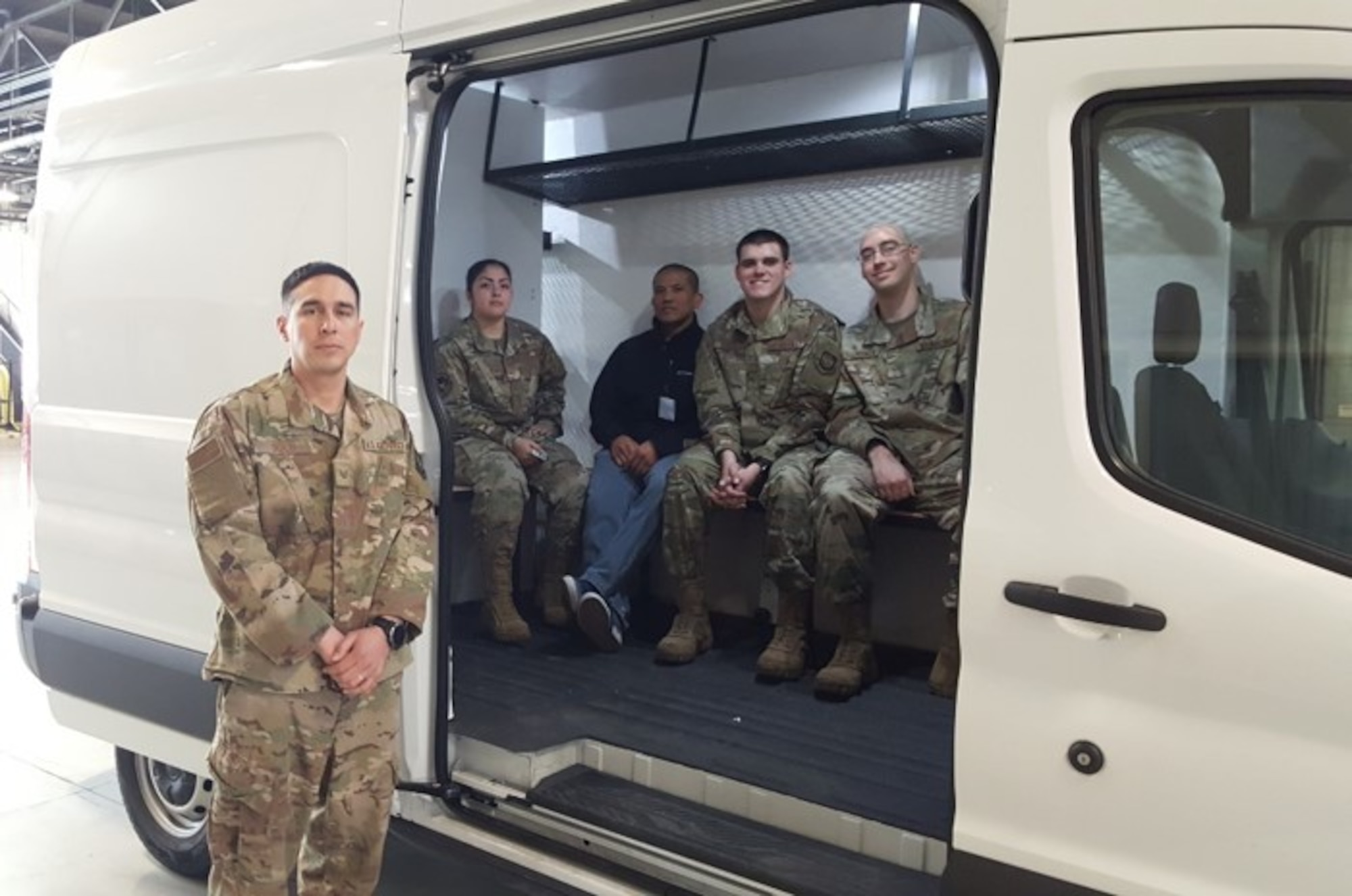 Airmen from the 92nd Logistics Readiness Squadron pose with an upgraded transit van March 5, 2020, at Fairchild Air Force Base, Washington.