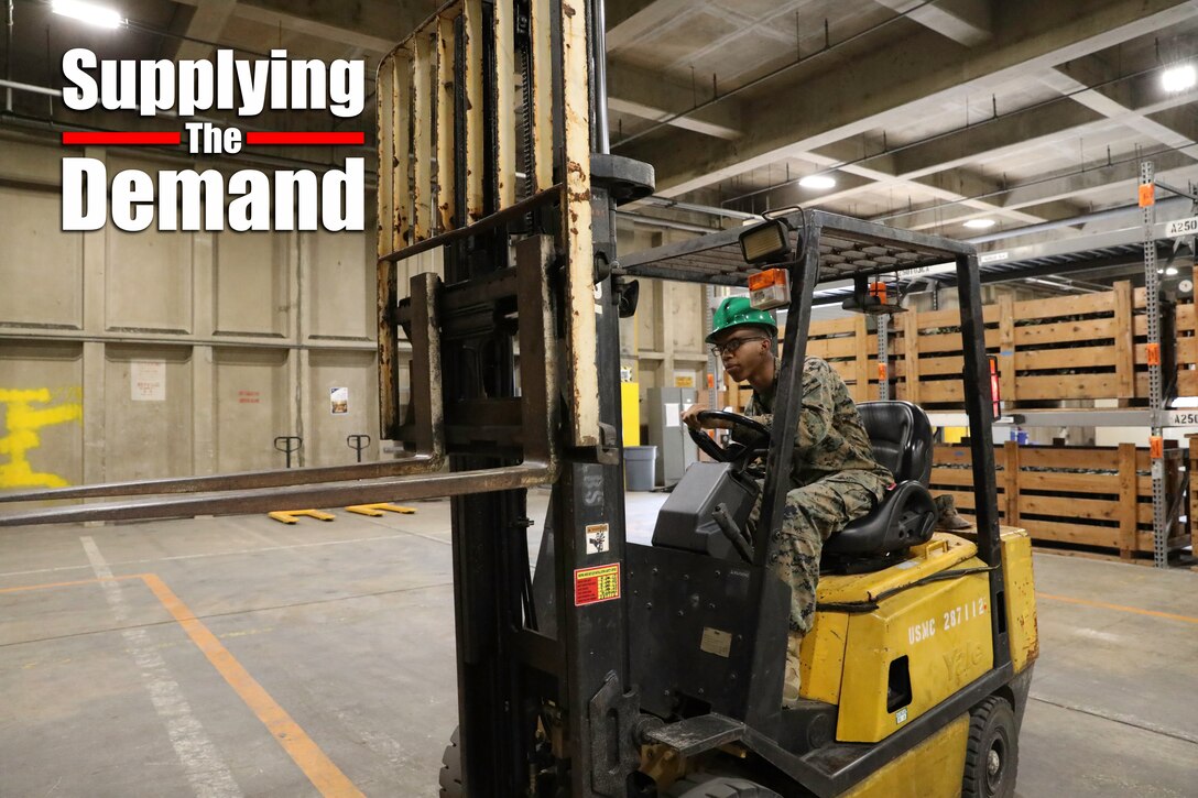 U.S. Marine Corps Lance Cpl. Christopher Faison maneuvers a forklift on Camp Kinser, Okinawa, Japan, Jan. 27, 2020. Supply Marines with Combat Logistics Regiment 37, 3rd Marine Logistics Group, organize and prepare gear and equipment for their annual regimental field exercise. Faison, a native of Uniondale, New York, is an inventory maintenance specialist with CLR-37, 3rd MLG. (U.S. Marine Corps photo by Lance Cpl. Alpha Hernandez)