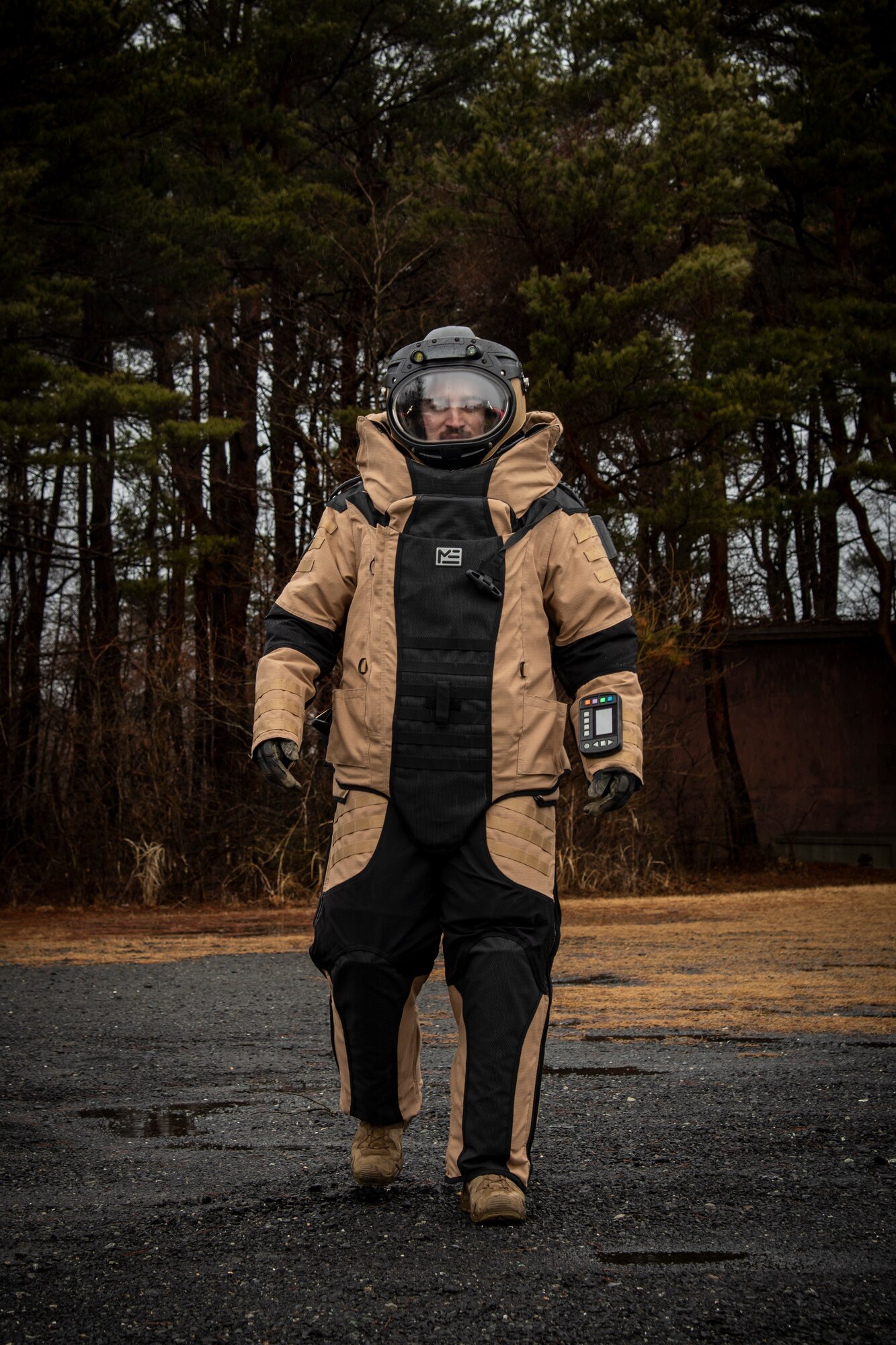 U.S. Air Force Staff Sgt. Tanner Connally, a 35th Civil Engineer Squadron Explosive Ordnance Disposal journeyman, walks to the training site in a bomb suit at Misawa Air Base, Japan, March 3, 2020. The bomb suit contains plates that protect personnel from any shrapnel if an improvised explosive device detonates. (U.S. Air Force photo by Airman 1st Class China M. Shock)