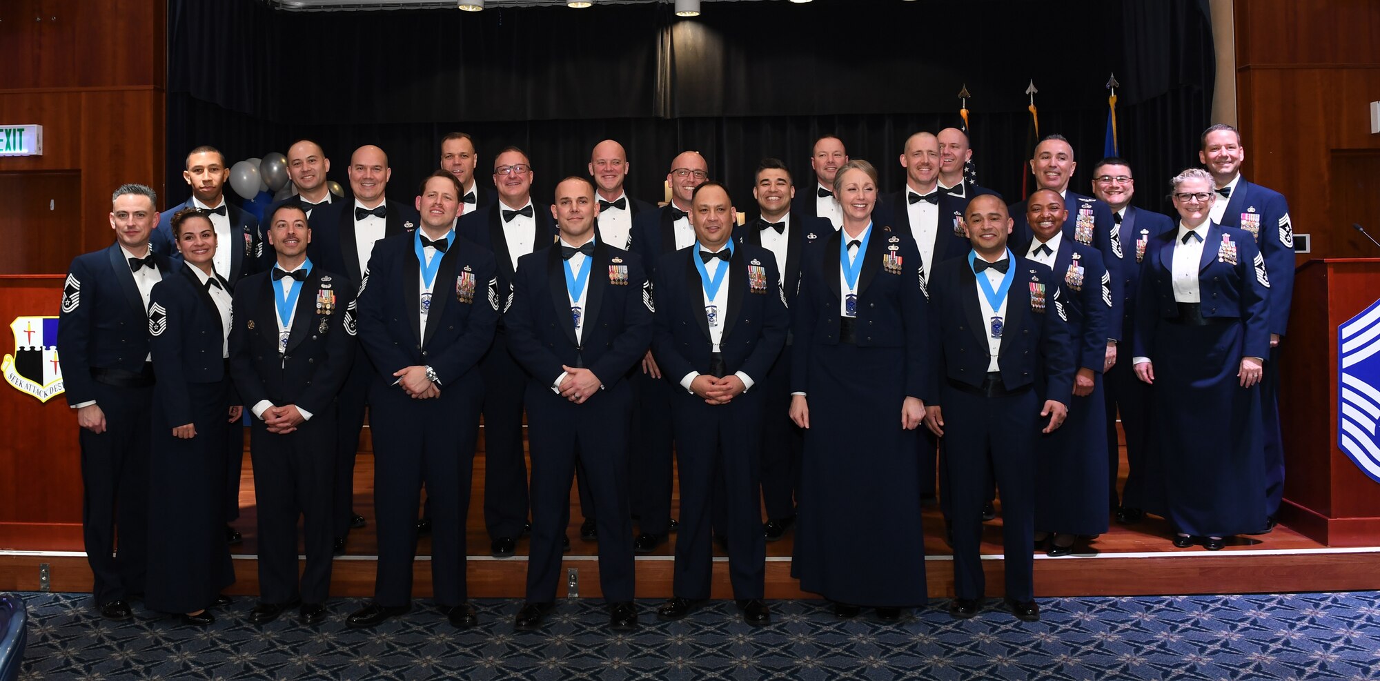 52nd Fighter Wing chief master sergeant selectees pose for a group photo with 52 FW chief master sergeants at the annual Chief Recognition Ceremony at Spangdahlem Air Base, Germany, Mar. 6, 2020. The selectees celebrated moving to the rank of chief master sergeant and enjoyed a dinner with family and friends. (U.S. Air Force photo by Airman 1st Class Alison Stewart)