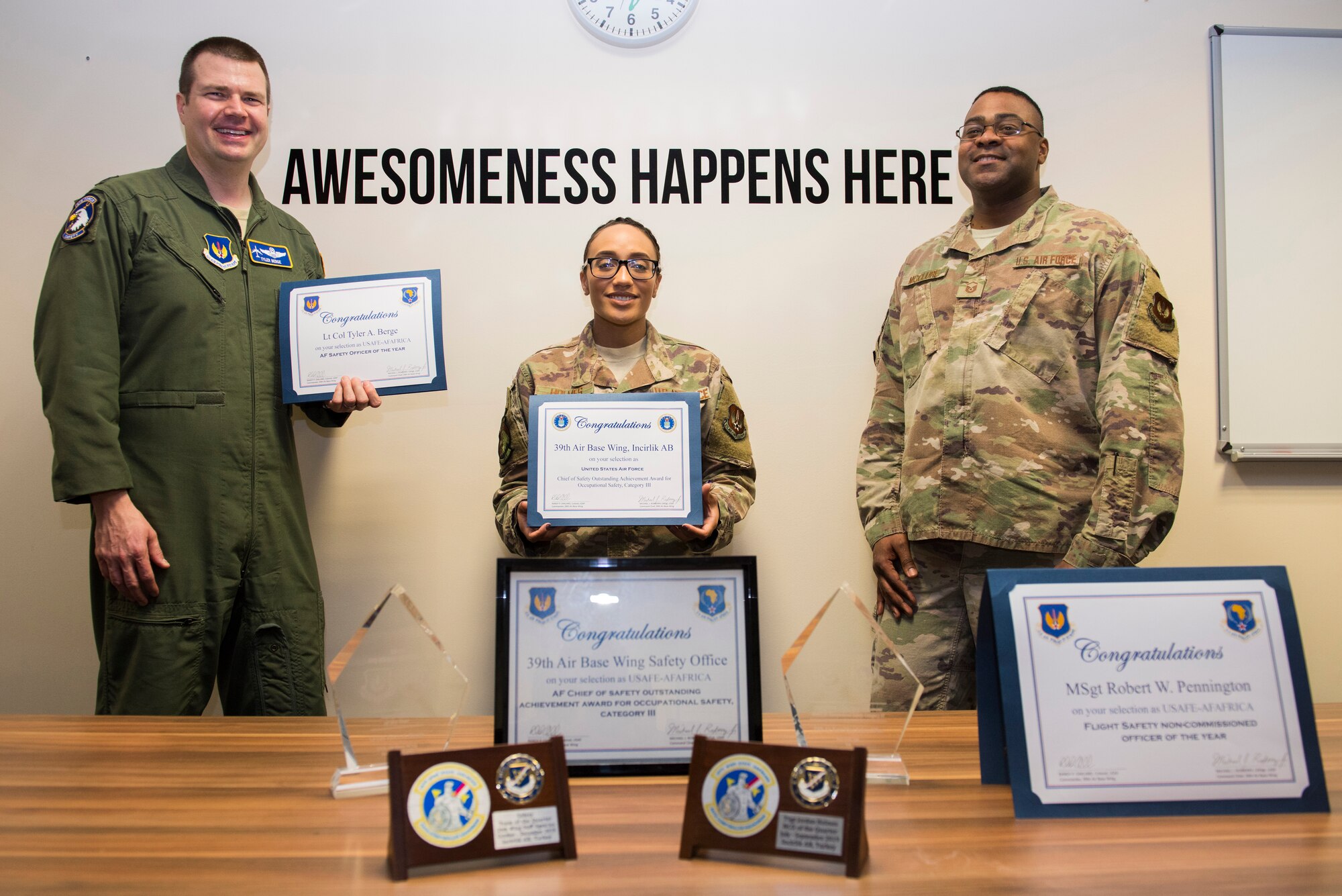 39th Air Base Wing Safety office staff presents their many Air Force level awards, March 4, 2020, at Incirlik Air Base, Turkey. These awards recognize their achievements in occupational safety. (U.S. Air Force photo by Senior Airman Matthew Angulo)