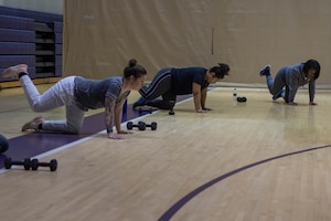 A photo of pregnant Soldiers exercising