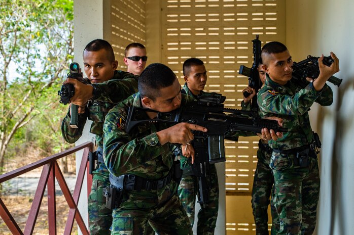 Royal Thai Marines demonstrate close quarters tactics during a CQT exchange in Hat Yao, Kingdom of Thailand, March 3.