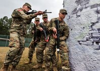 Citadel cadets simulate clearing a room at the Naval Weapons Station Charleston, Joint Base Charleston, S.C., March 3, 2020.