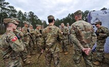 Tech. Sgt. Christopher Marino, 628th Security Forces Squadron flight sergeant, briefs cadets from the Citadel during a joint training exercise at the Naval Weapons Station Charleston, Joint Base Charleston, S.C., March 3, 2020.