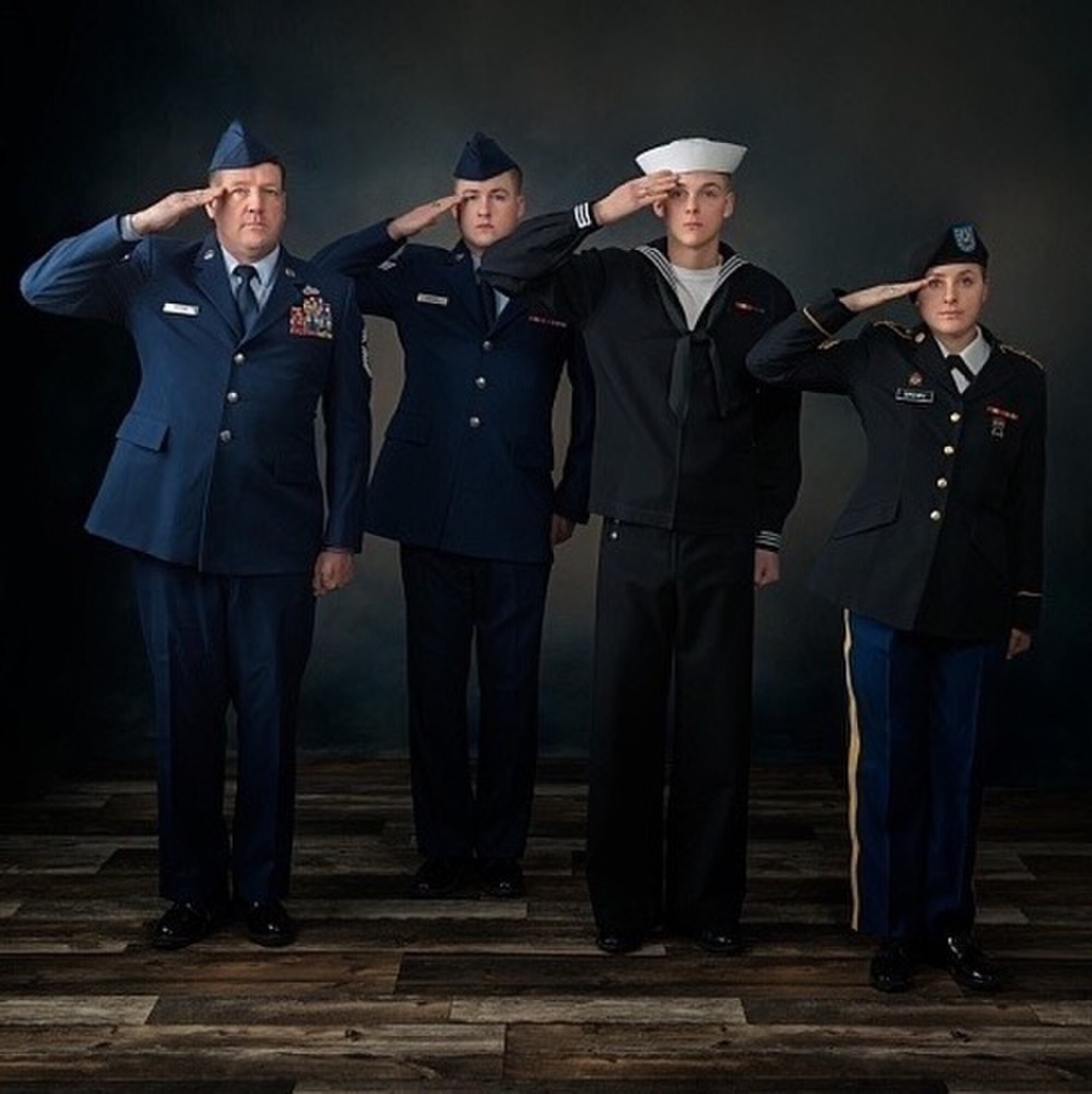 Command Chief Master Sgt. Sid Brown, state command chief, Idaho Air National Guard; Senior Airman Everett Brown, traffic management specialist, 124th Logistics Readiness Squadron; Seaman Wesley Brown, hospital corpsman, Wayne Caron Clinic, Camp Lejeune, North Carolina; Cpl. Kassandra Brown, ammunitions specialist, G Company, 145th Brigade Support Battalion pose for a family photo. (Courtesy Photo)