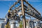 Staff Sgt. Manoj Williams, 375th Civil Engineering Squadron electrical systems craftsman, greases substation 6 framework knife blades and addresses tightening loose conductor connections April 9, 2016 at Scott Air Force Base.