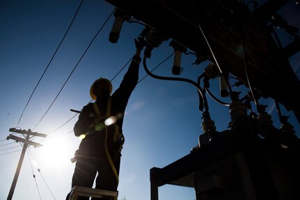 Staff Sgt. Manoj Williams, 375th Civil Engineering Squadron electrical systems craftsman, greases substation 6 framework knife blades and addresses tightening loose conductor connections April 9, 2016 at Scott Air Force Base.