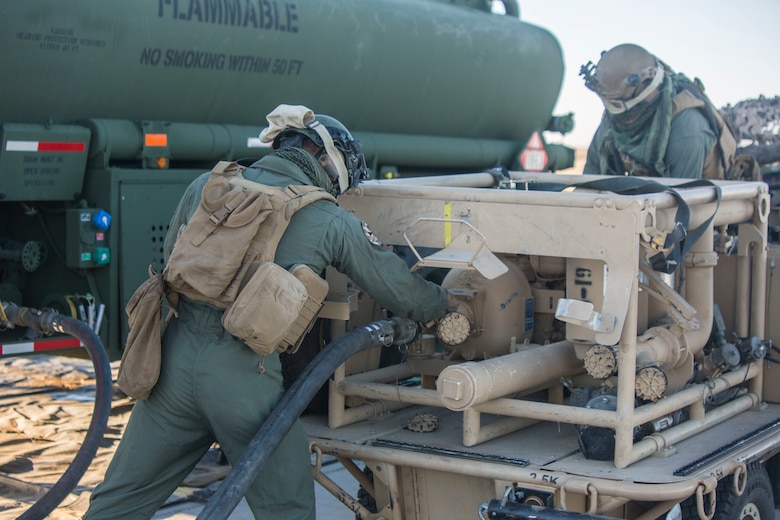 U.S. Marines with Marine Wing Support Squadron (MWSS) 371, Marine Wing Support Group (MWSG) 37, 3rd Marine Aircraft Wing (MAW), operate a tactical aviation ground refueling system (TAGRS) during a forward area refueling point (FARP) operation at Marine Corps Air Station Yuma, Feb. 4, 2020. The TAGRS enables the MWSS to rapidly establish a high-throughput, dual-point refueling site while maintaining critical mobility in austere locations making it a valuable asset for the MAW. (U.S. Marine Corps Photo by Lance Cpl. Julian Elliott-Drouin)