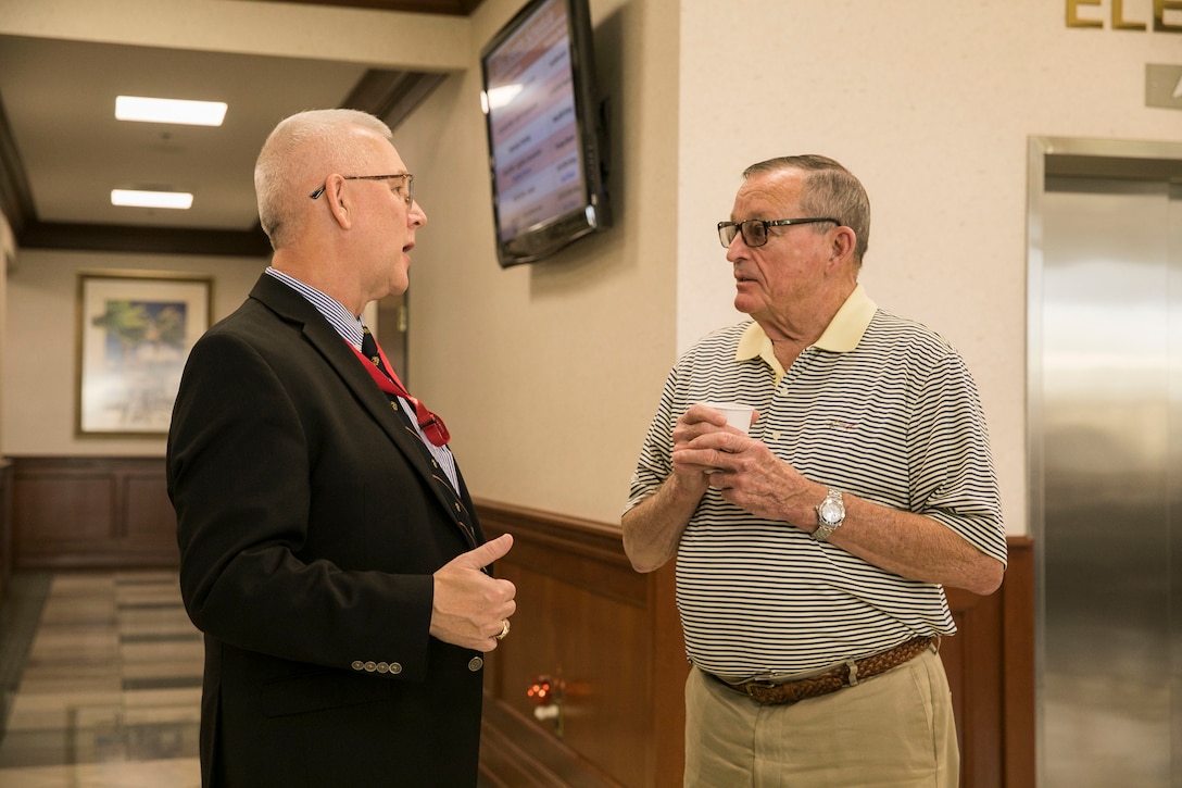 David Dawson, the historian of U.S. Central Command, left, speaks with Baden Bessent, retired U.S. Army Col., of the Rapid Deployment Joint Task Force (RDJTF) during the 40th anniversary of the RDJTF on MacDill Air Force Base, March 3, 2020. (U.S. Marine Corps photo by Sgt. Roderick Jacquote)