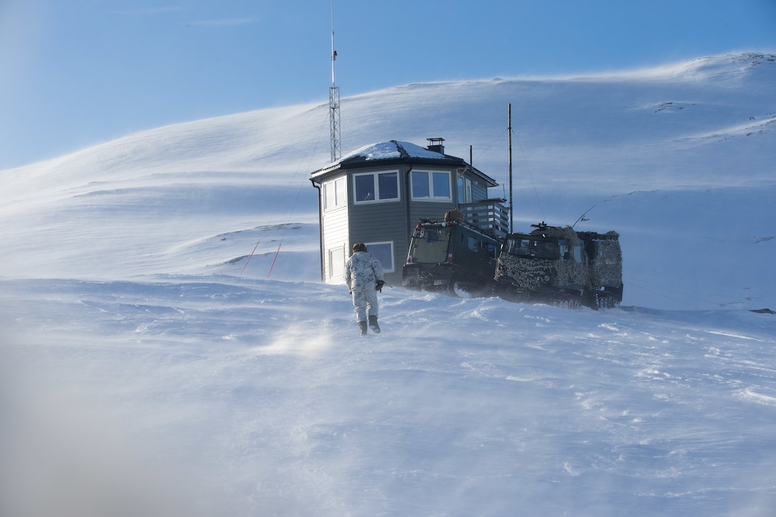 U.S. Marines with II Marine Expeditionary Force call for artillery fire at a forward observation post in Setermoen, Norway, March 4, 2019. Marines are in Norway preparing for Exercise Cold Response 20, a Norwegian-led exercise designed to enhance military capabilities and allied cooperation in high-intensity warfighting in a challenging arctic environment. (U.S. Marine Corps photo by Lance Cpl. Zane Ortega)