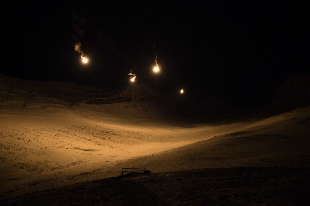 U.S. Marines with II Marine Expeditionary Force fire continuous illumination rounds in Setermoen, Norway, March 4, 2020. Marines are in Norway preparing for Exercise Cold Response 20, a Norwegian-led exercise designed to enhance military capabilities and allied cooperation in high-intensity warfighting in a challenging arctic environment. (U.S. Marine Corps photo by Lance Cpl. Zane Ortega)