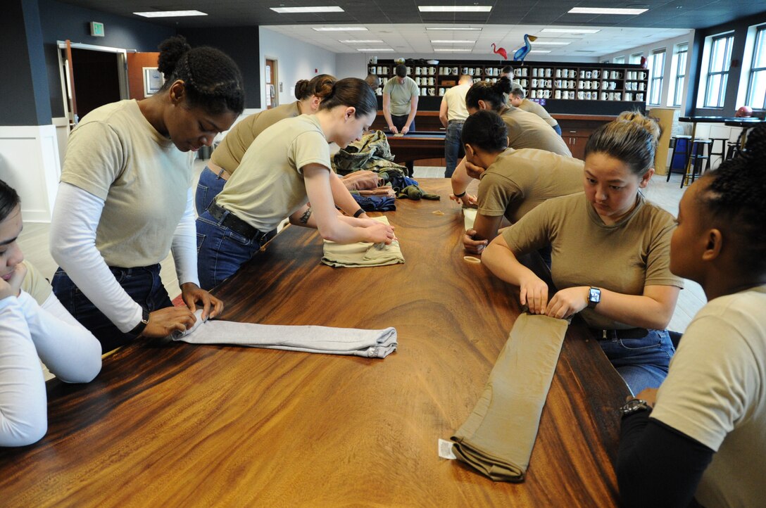 D&TF recruits fold shirts the BMT way