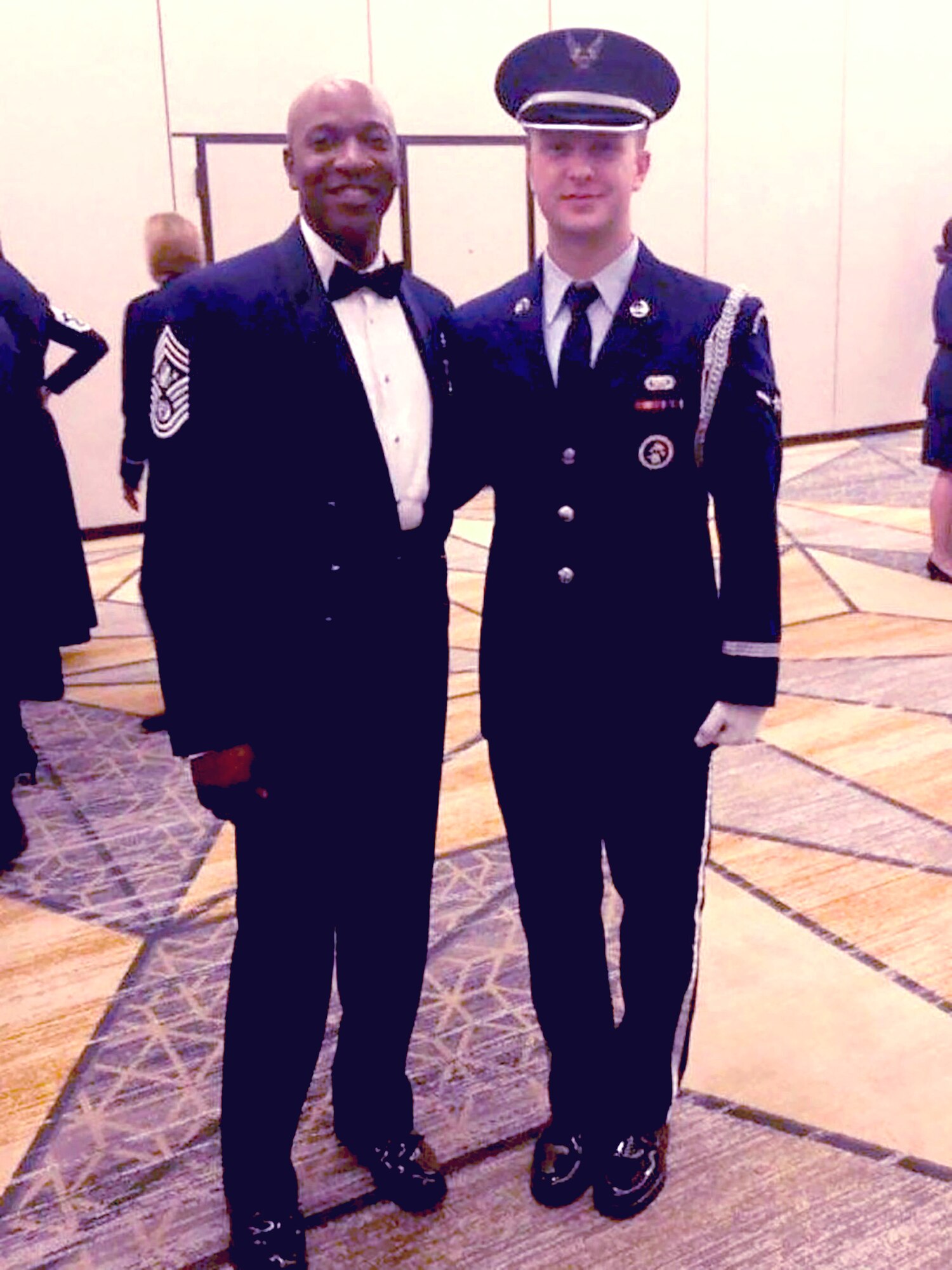 A1C Schneck posing with Chief Master Sergeant of the Air Force