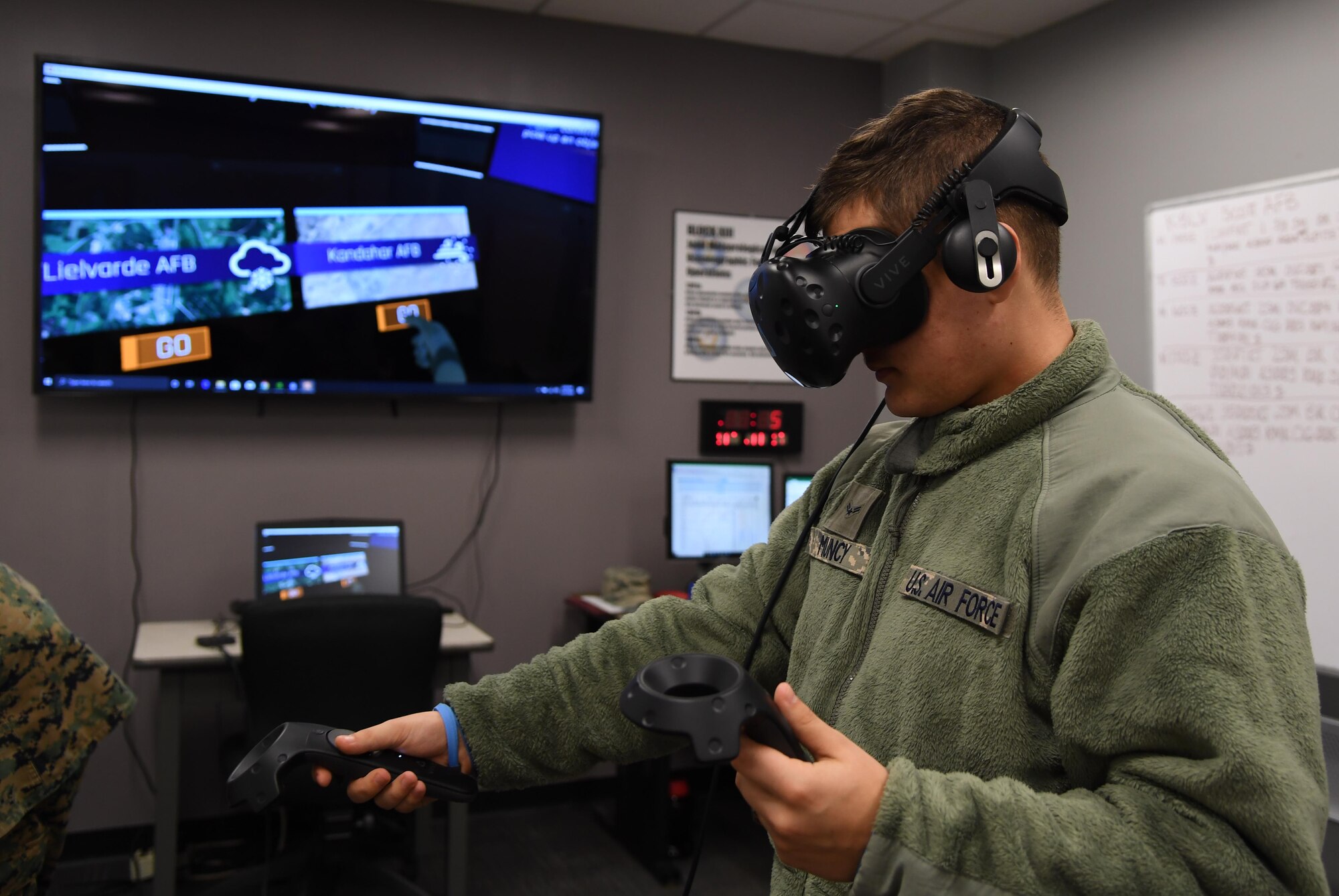 U.S. Air Force Airman 1st Class Ethan Muncy, 335th Training Squadron student, uses virtual reality to observe weather patterns inside the Joint Weather Training Facility at Keesler Air Force Base, Mississippi, Jan. 27, 2020. The weather apprentice course, which graduated 650 students this past year, takes 151 academic days to complete. Approximately 7,400 students go through the 335th TRS's 13 Air Force Specialty Codes each year. (U.S. Air Force photo by Kemberly Groue)