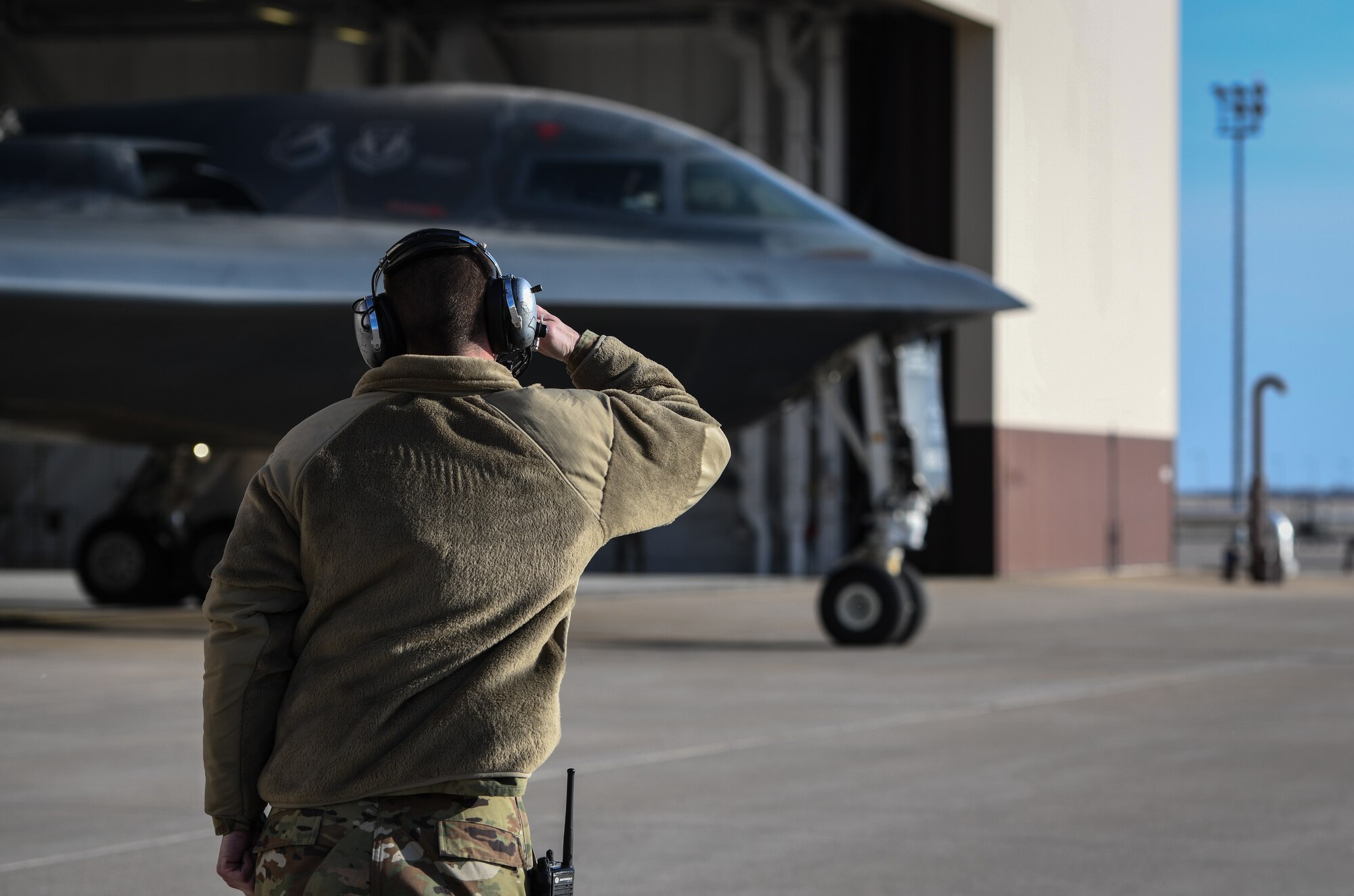 U.S. Air National Guard Tech. Sgt. Justin Aeckerle, a B-2 crew chief assigned to the 131st Maintenance Squadron, salutes B-2 Spirit pilot before takeoff at Whiteman Air Force Base, Missouri, March 8, 2020. The B-2 "Spirit of Washington" launched from Whiteman AFB to support U.S. Strategic Command Bomber Task Force operations in Europe. The 131s Bomb Wing’s 131st MXS is the total-force partner unit to the 509th Bomb Wing. (U.S. Air Force photo by Tech. Sgt. Alexander W. Riedel)