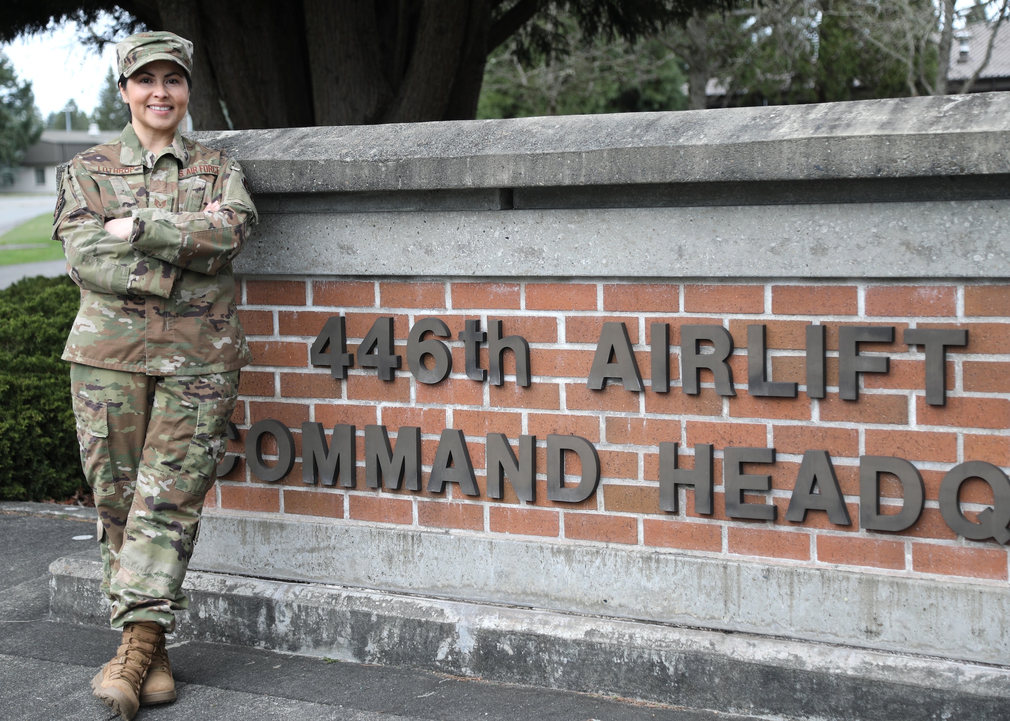 U.S. Air Force Staff Sgt. Crystal Y. Lothrop, 446th Force Support Squadron education and training technician, poses outside the 446th Airlift Wing headquarters building on Joint Base Lewis-McChord, Washington, Feb. 25, 2020.