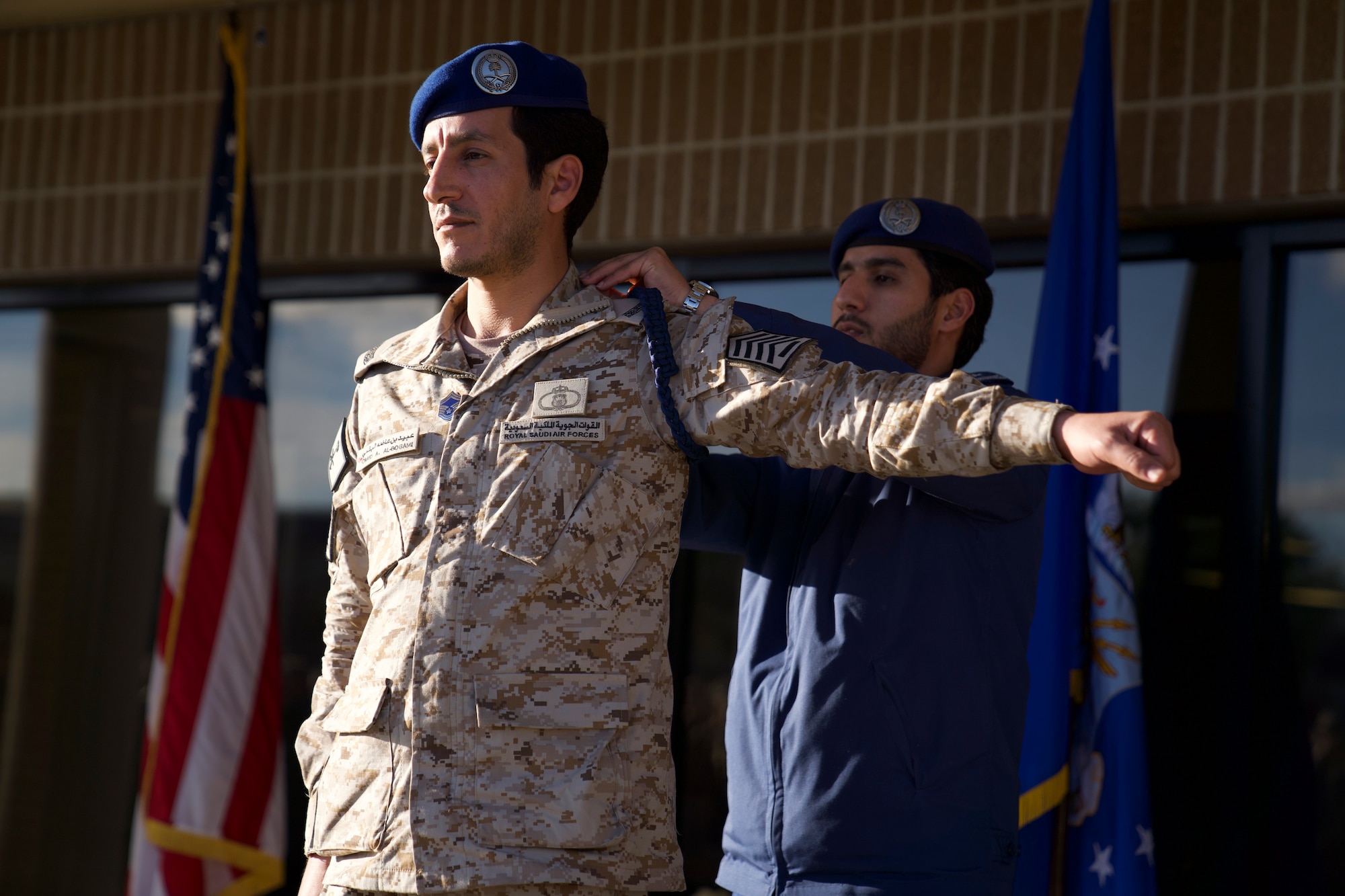 Royal Saudi air force Senior Master Sgt. Obaid Al-Bogami, 81st Training Support Squadron Military Training Leader course student, recieves a blue rope during the MTL course graduation ceremony outside the Levitow Training Support Facility at Keesler Air Force Base, Mississippi, March 5, 2020. Al-Bogami was the first international student the MTL schoolhouse graduated in approximately three years. (U.S. Air Force photo by Airman 1st Class Spencer Tobler)