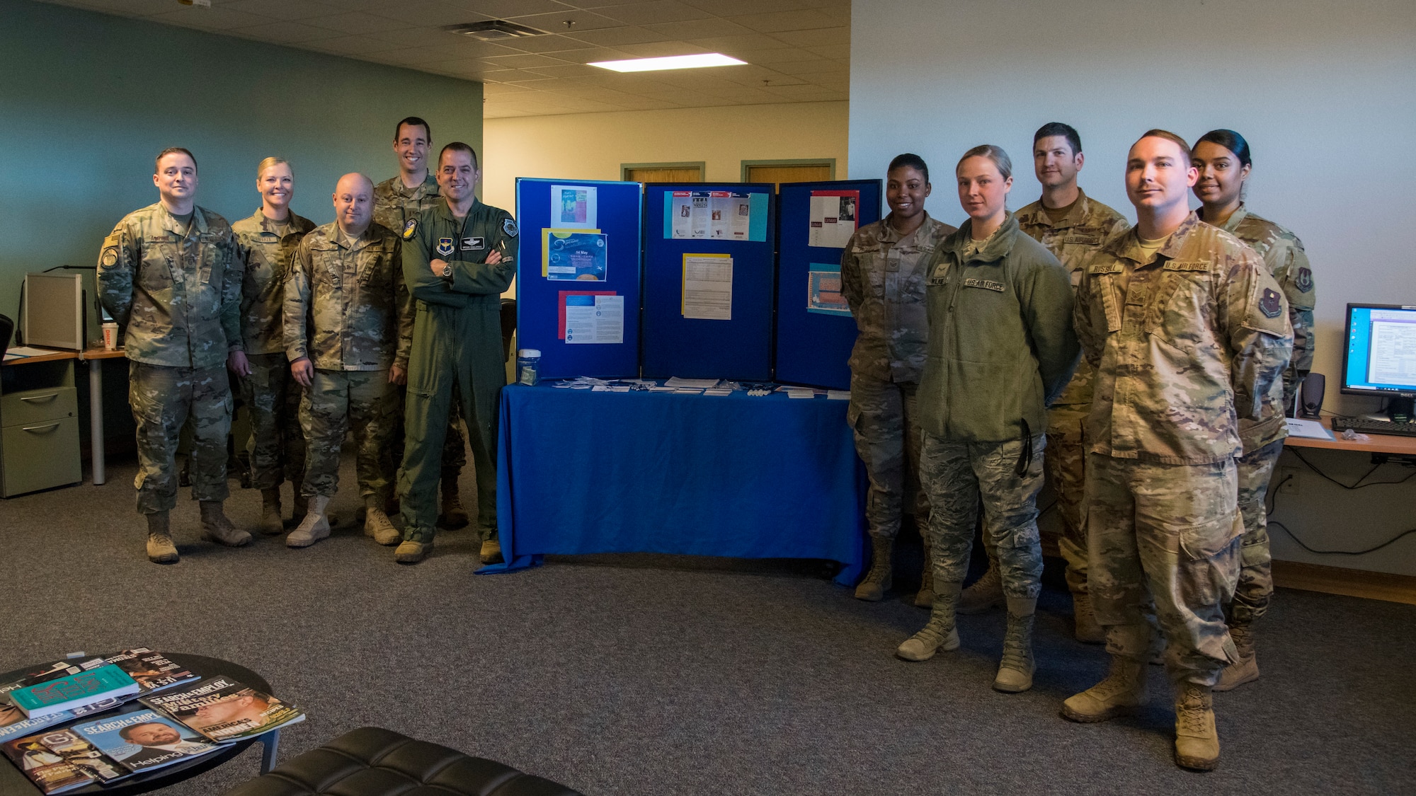 Air Force Assistance Fund volunteers and base leadership pause for a photo at the AFAF kick-off event at the Holloman Airman and Family and Readiness Center Mar. 2, 2020. The AFAF is a charitable donation campaign comprised of four charities that provide funds to active-duty service members, retirees, reservists, guard, dependents and surviving spouses in need. (U.S. Air Force photo by Senior Airman Collette Brooks)