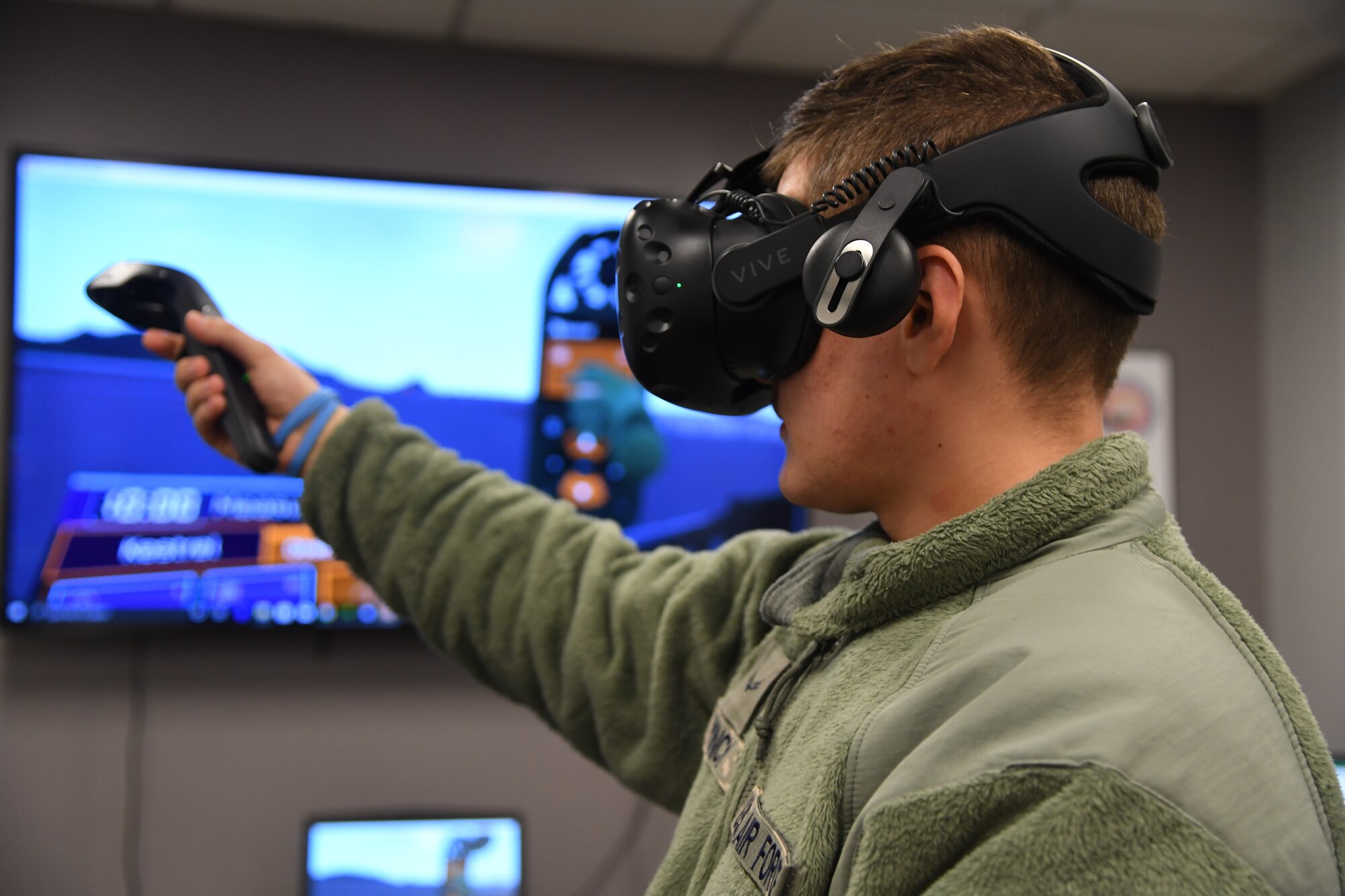 U.S. Air Force Airman 1st Class Ethan Muncy, 335th Training Squadron student, uses virtual reality to observe weather patterns inside the Joint Weather Training Facility at Keesler Air Force Base, Mississippi, Jan. 27, 2020. The weather apprentice course, which graduated 650 students this past year, takes 151 academic days to complete. Approximately 7,400 students go through the 335th TRS's 13 Air Force Specialty Codes each year. (U.S. Air Force photo by Kemberly Groue)
