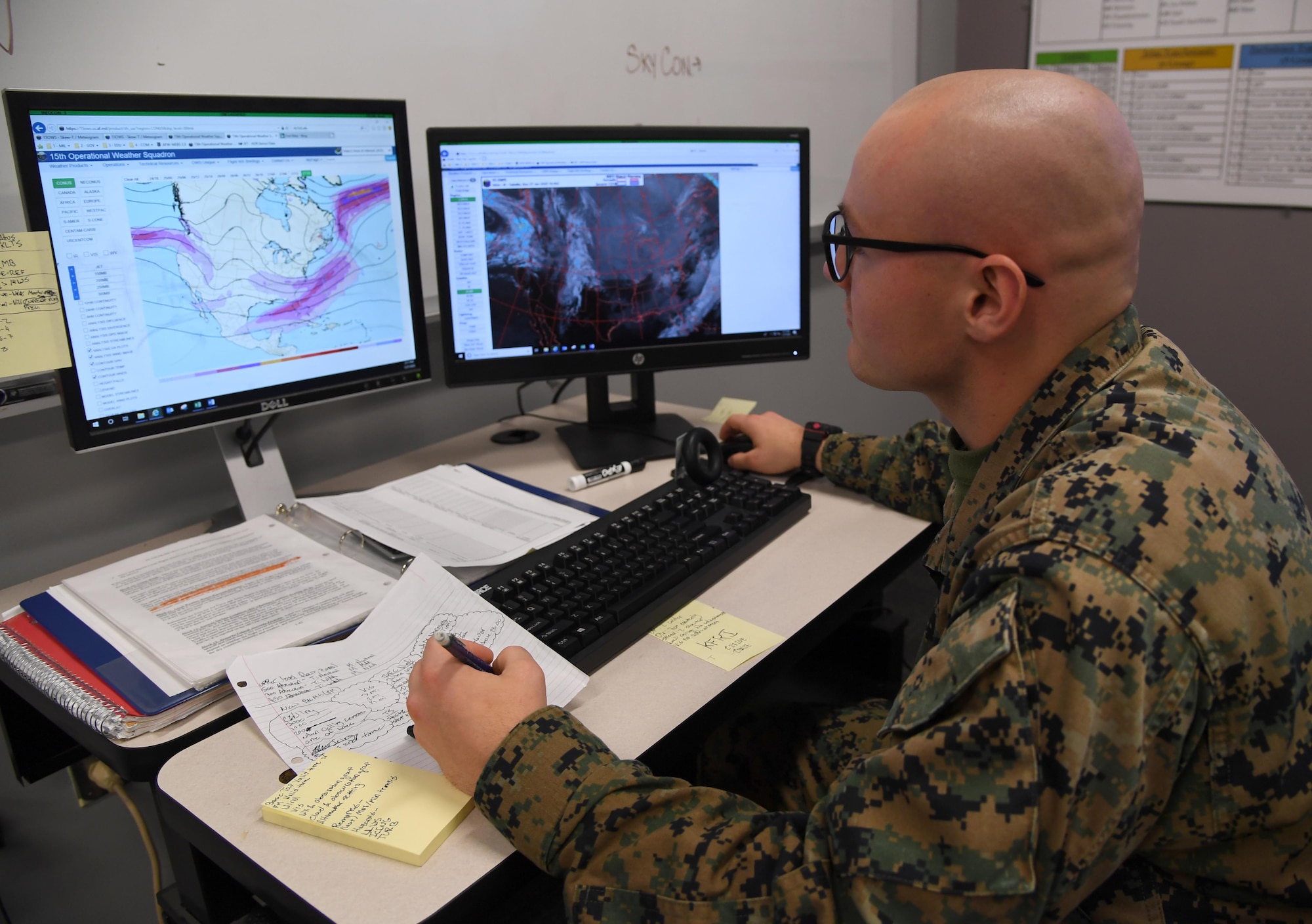 U.S. Marine Corps Lance Cpl. Hayden Weiss, Keesler Marine Detachment student, conducts a weather analysis inside the Joint Weather Training Facility at Keesler Air Force Base, Mississippi, Jan. 27, 2020. The weather apprentice course, which graduated 650 students this past year, takes 151 academic days to complete. Approximately 7,400 students go through the 335th TRS's 13 Air Force Specialty Codes each year. (U.S. Air Force photo by Kemberly Groue)