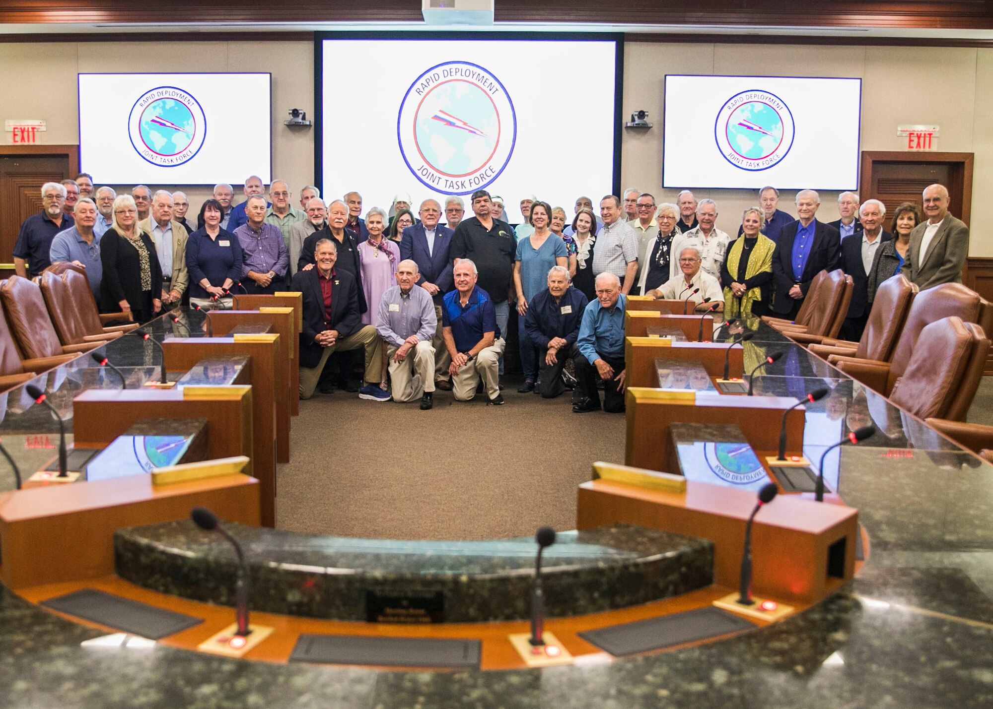 Former Members of the Rapid Deployment Joint Task Force (RDJTF) pose for a group photo during the RDJTF 40th Anniversary on MacDill Air Force Base, March 3, 2020. (U.S. Marine Corps photo by Sgt. Roderick Jacquote)