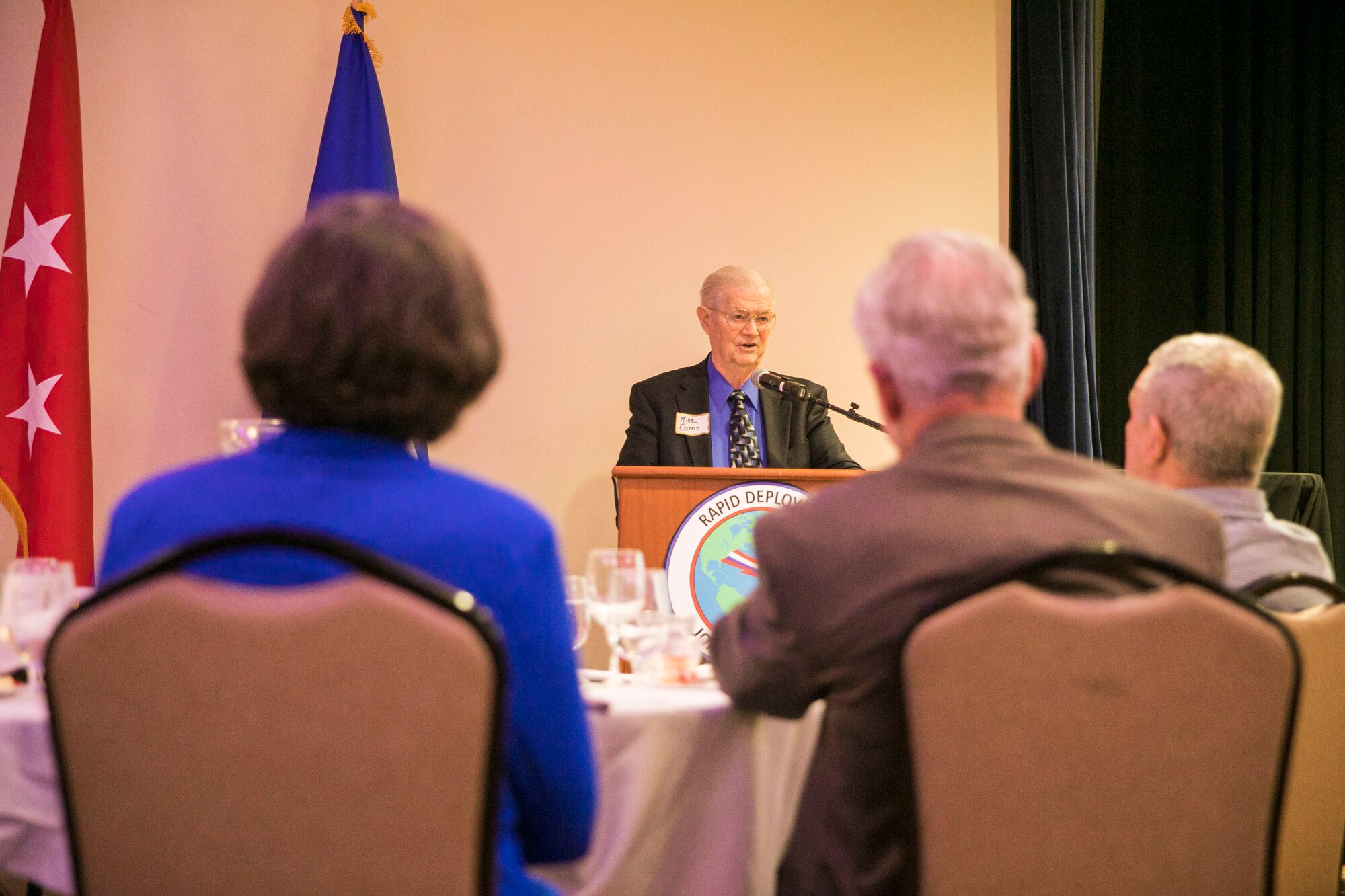 Michael Carns, retired U.S. Air Force Gen., speaks to former members of the Rapid Deployment Joint Task Force (RDJTF) during the RDJTF 40th Anniversary on MacDill Air Force Base, March 3, 2020. (U.S. Marine Corps photo by Sgt. Roderick Jacquote)