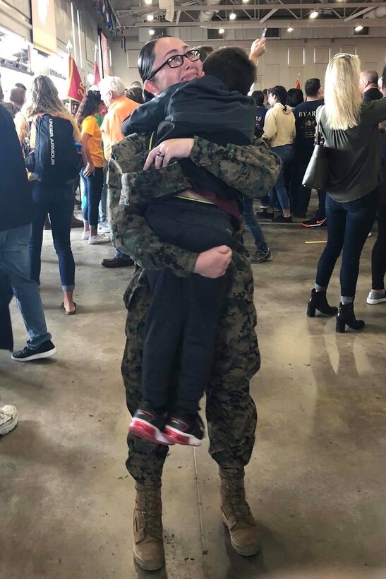 U.S. Marine Corps Pfc. Brooke Billiot is reunited with her son, Kysan, following a graduation ceremony at Marine Corps Recruit Depot Parris Island, Feb. 14, 2020. In order to become a Marine, Billiot was required to relinquish custody of her son, due to the inability of recruits to care for their dependents while completing the 13-week training cycle. (Courtesy photo)