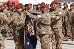 Lt. Col. David Santos, commander of the 1st Battalion, 294th Infantry Regiment, Guam National Guard, and Command Sgt. Maj. Kenneth Cruz, the 1-294th senior enlisted advisor, case the units colors during a transfer of authority ceremony on South Camp, in Sharm el-Sheikh, Egypt, March 8, 2020. For the past 9 months, the 1-294th have served as the 66th rotational U.S. Army unit in support of the MFO peacekeeping mission.