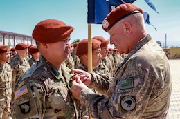 aj. Gen. Evan Williams, Commanding General of the Multinational Force and Observers presents a Soldier from the 1st Battalion, 294th Infantry Regiment, Guam National Guard, with the MFO Medals during the Transfer of authority ceremony on South Camp, in Sharm el-Sheikh, Egypt, March 8, 2020. For the past 9 months, the 1-294th have served as the 66th rotational U.S. Army unit in support of the MFO peacekeeping mission.