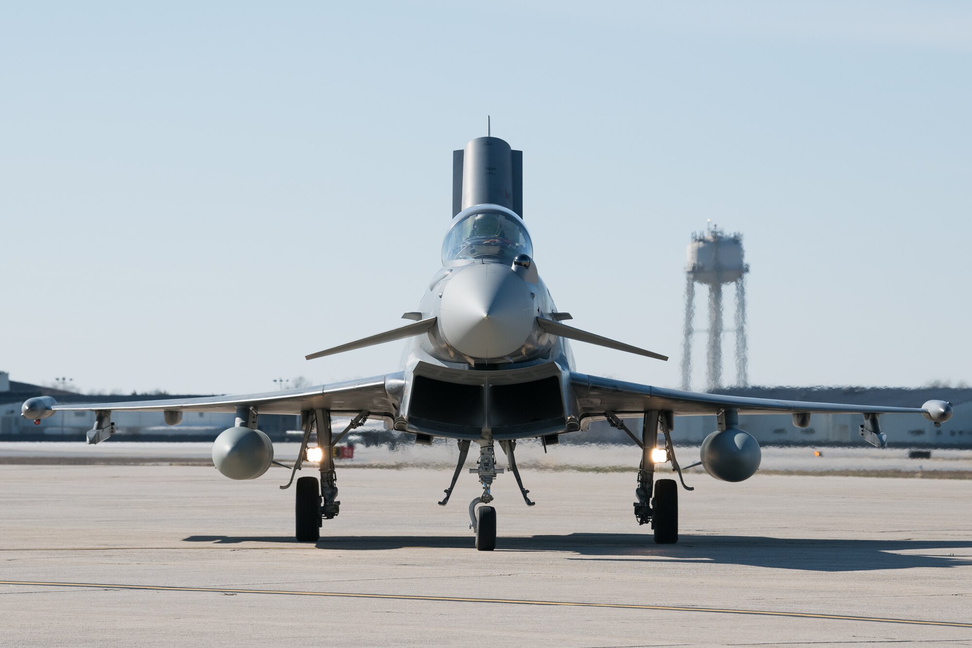 A Spanish Eurofighter Typhoon taxis to a parking spot after landing, March 1, 2020, at Dover Air Force Base, Delaware. The aircraft and crew stopped at Dover AFB on their way to Nellis AFB, Nevada for Exercise Red Flag 20-2, a multi-national, air-to-air combat training exercise. (U.S. Air Force photo by Mauricio Campino)